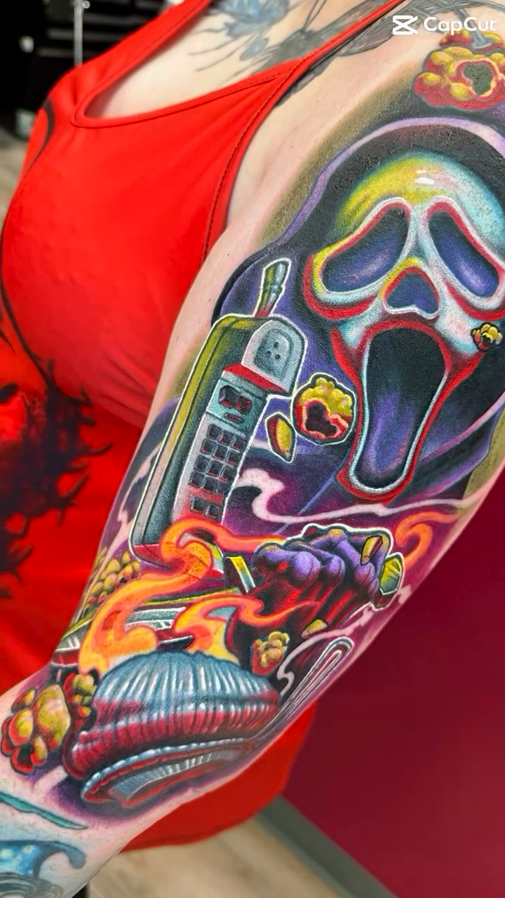 Ghostface mask with phone and tombstone new school tattoo by Albuquerque Tattoo Artist, Albuquerque, New Mexico