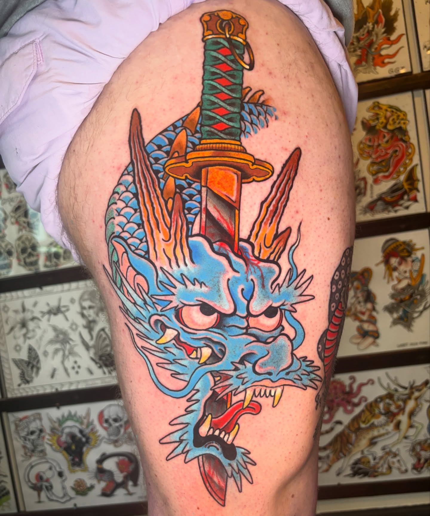 Dragon and katana American traditional tattoo on the thigh by Mike Maciejewski:Chicago Tattoo Artist