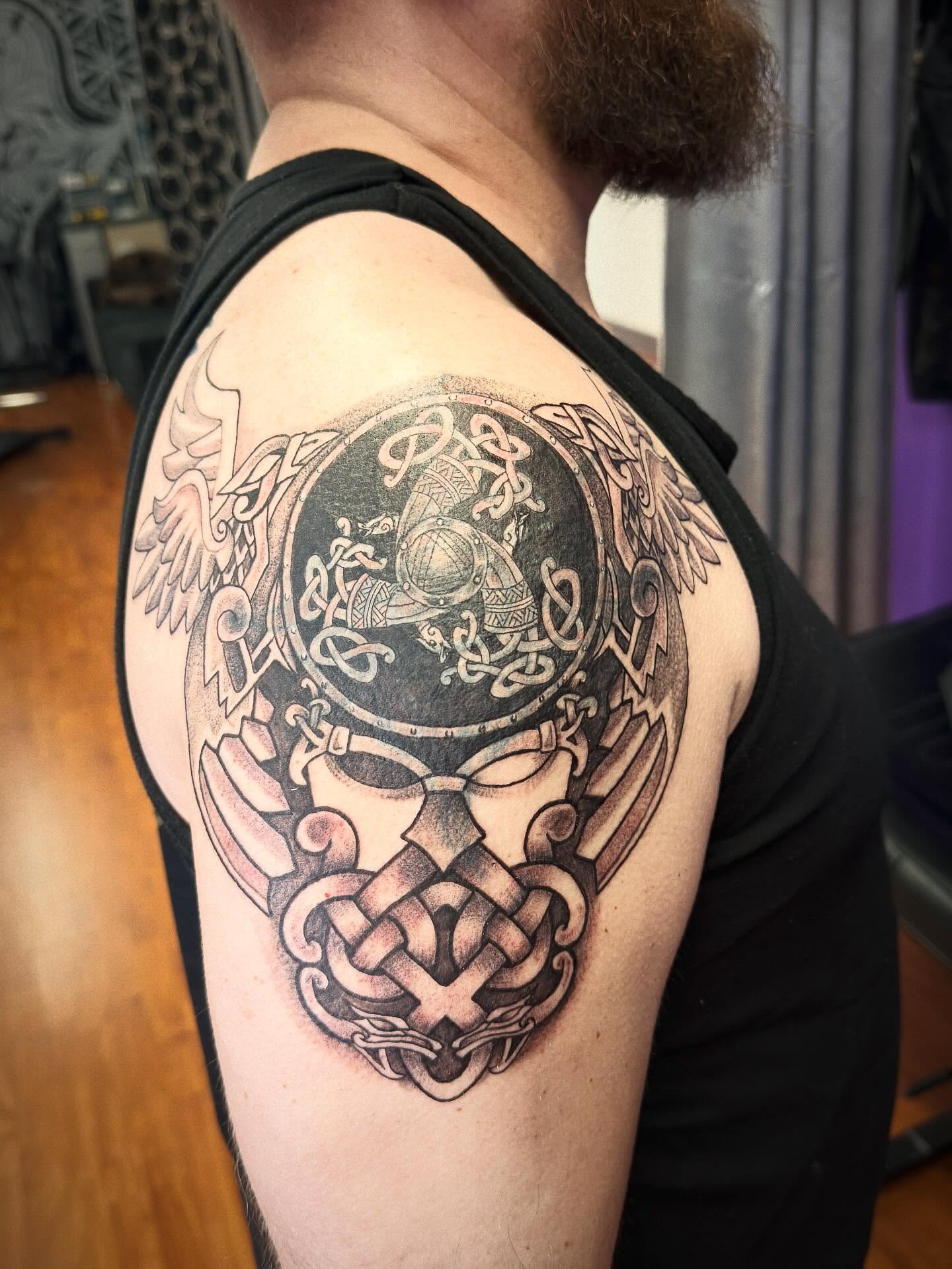 Tattoo by @tosh.pointo.tattoos — black_and_grey, geometric