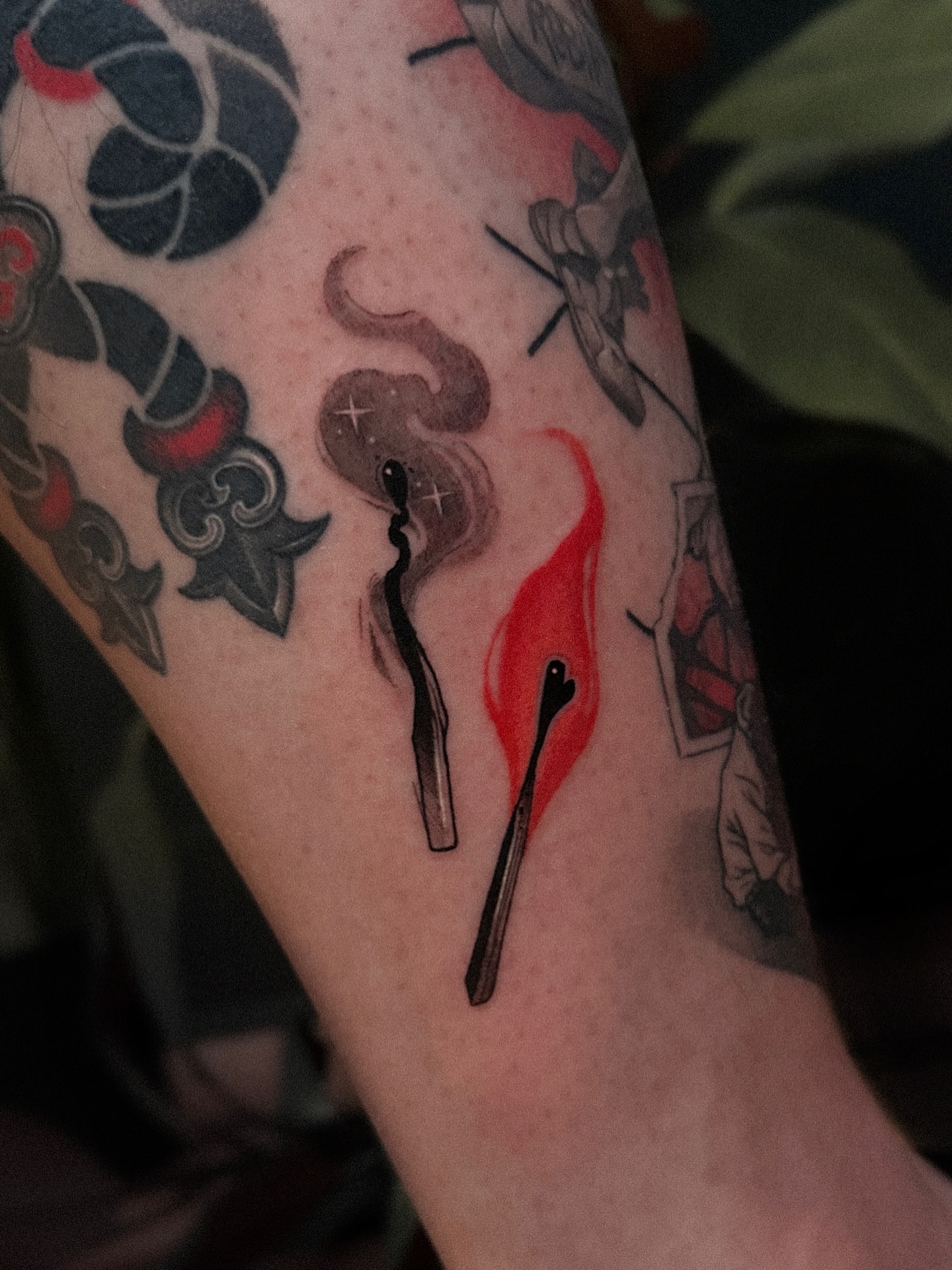 Matches and smoke American traditional tattoo on the forearm by Tattoo Artist 👩🏻‍🎨 ATX