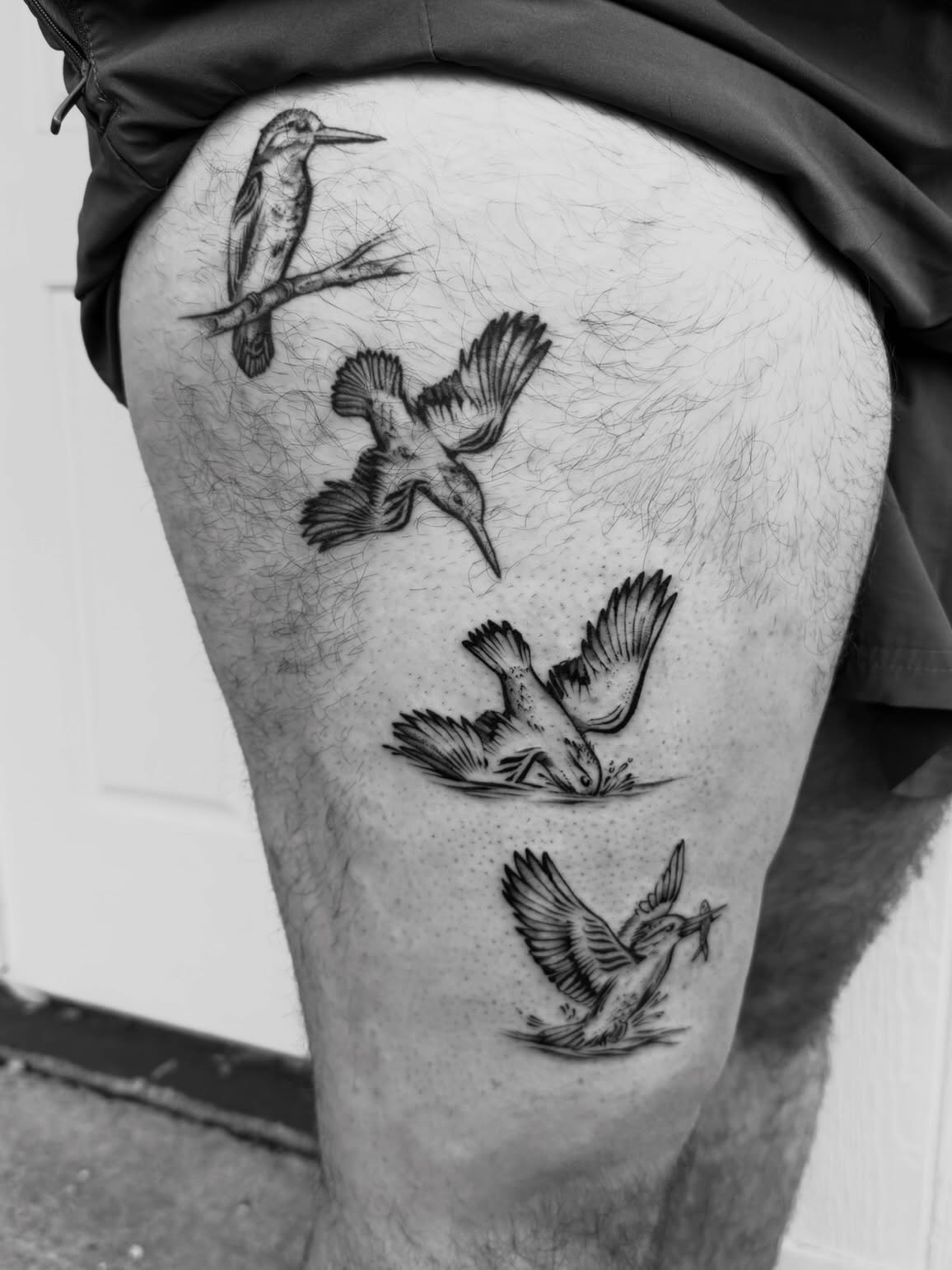 Birds realism tattoo on the thigh by Kingtide Ink