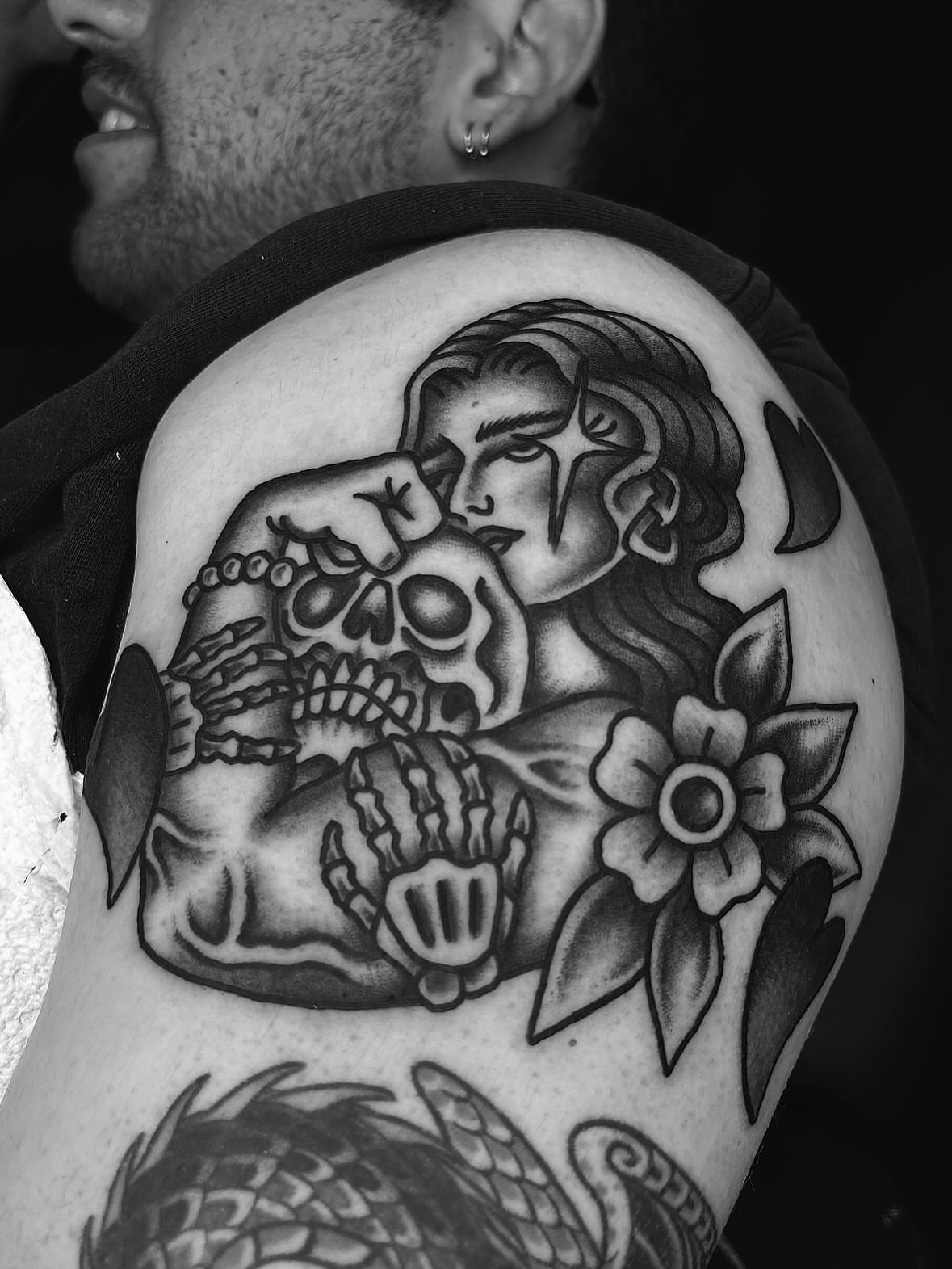 Woman with skull American traditional tattoo on the shoulder by ๐๐๐ฏ๐ข๐ซ