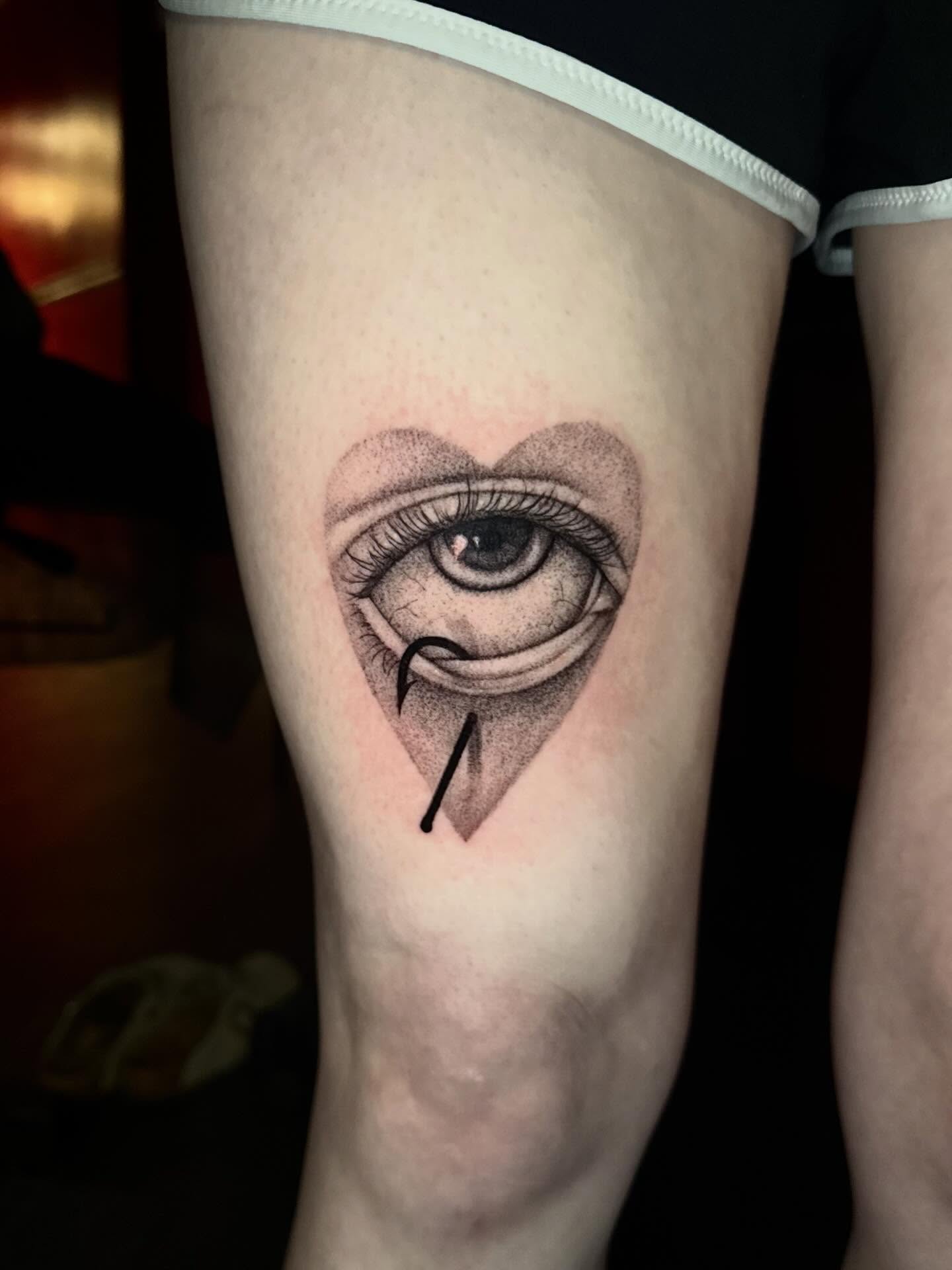 Eye dotwork tattoo on the calf by Madison Jasso