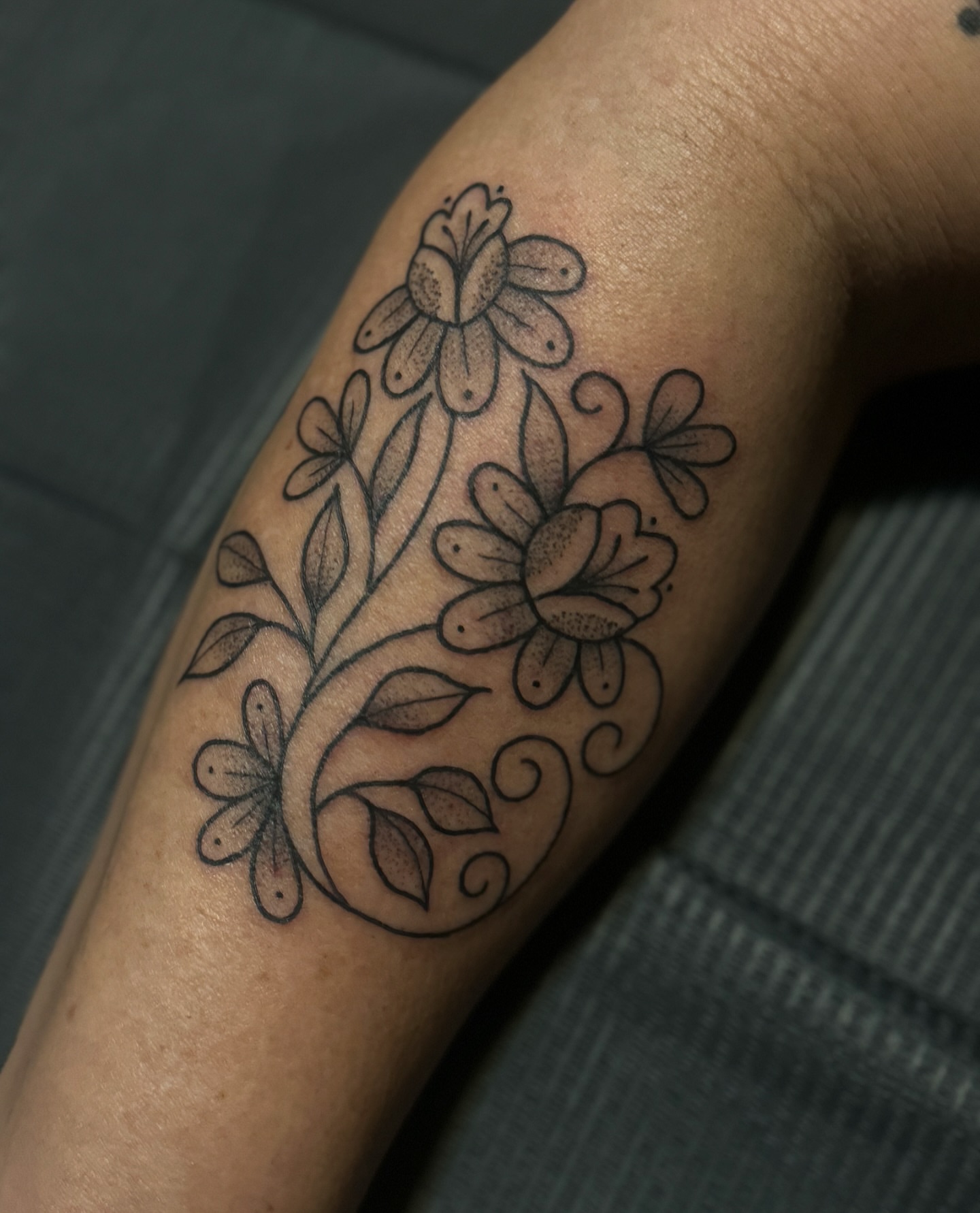 Floral design black and grey tattoo on the forearm by ꧁꧁Hayley꧂꧂