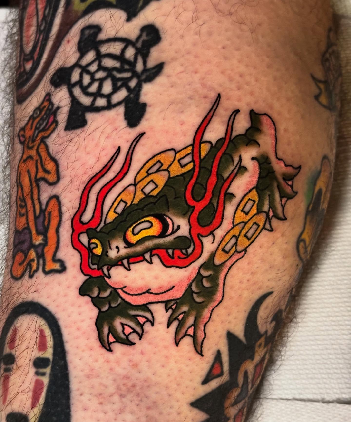 Dragon American traditional tattoo on the forearm by Tyler Whalen