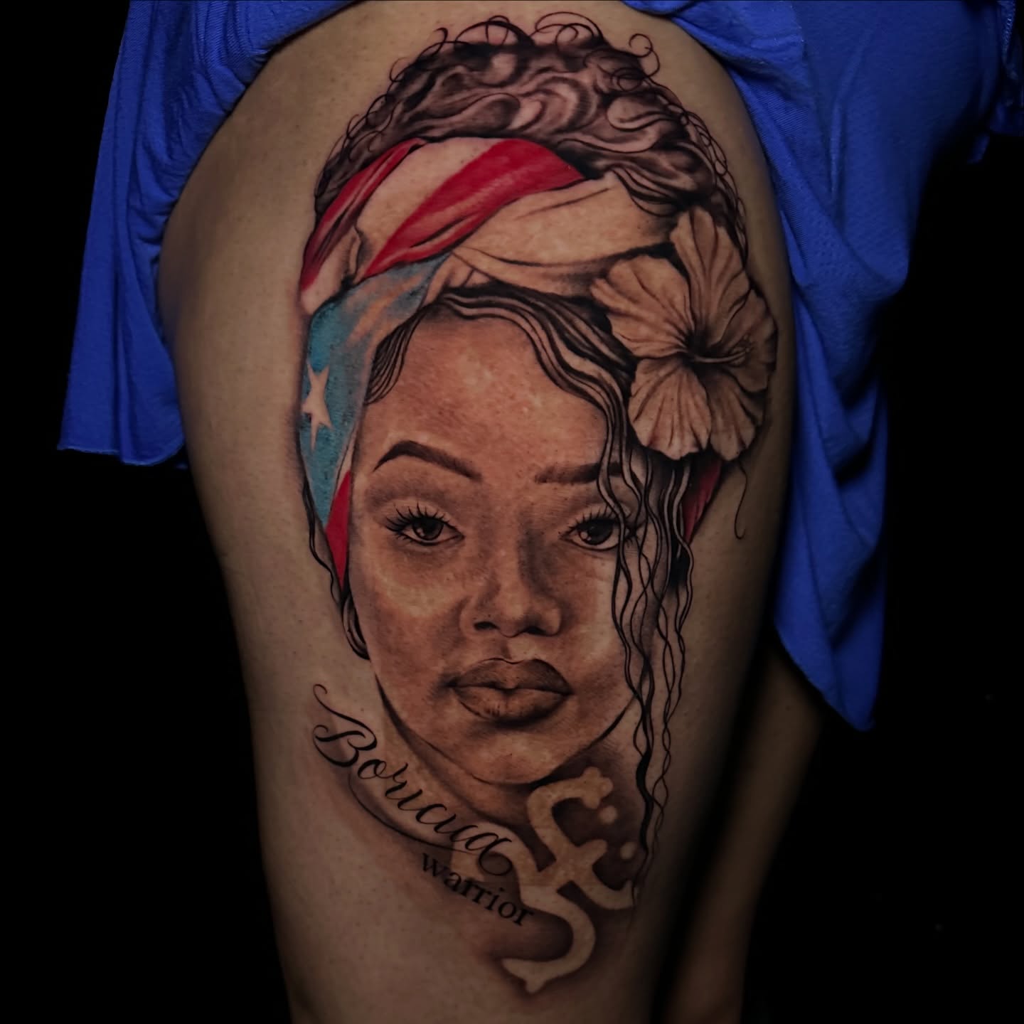 Woman with bandana realism tattoo on the shoulder by Dani B.