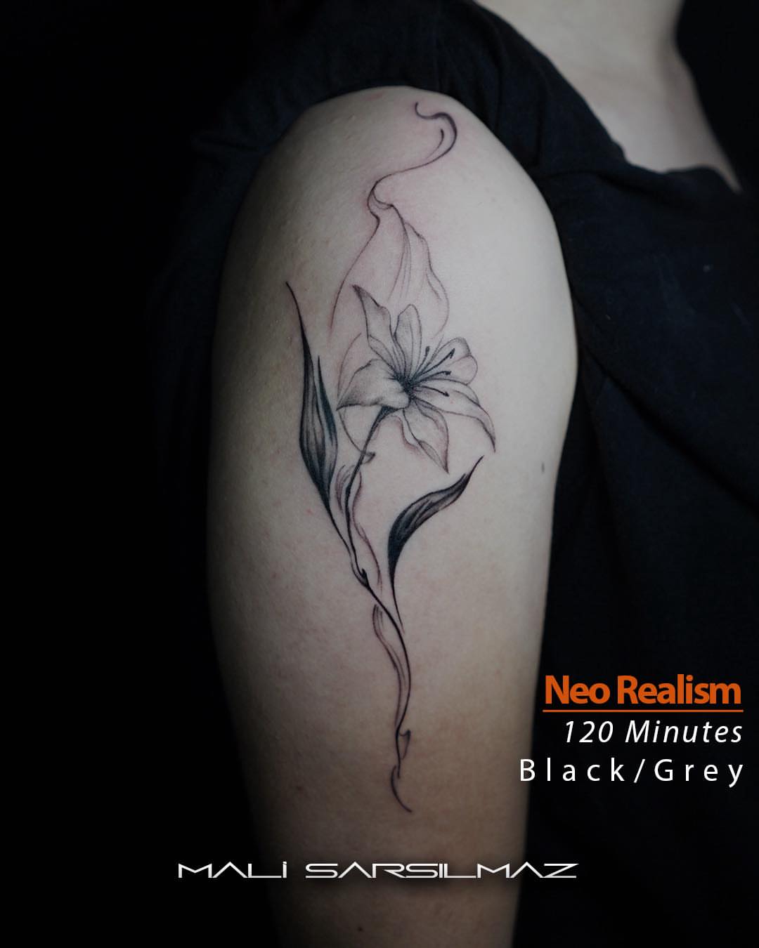 Lily black and grey tattoo on the shoulder by Mali Sarsılmaz, Nicosia, Cyprus