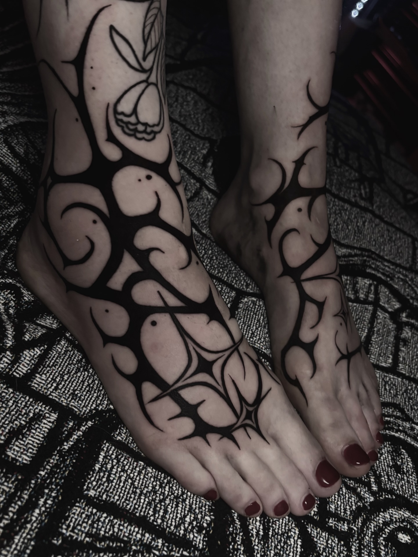 Abstract tribal design tribal tattoo on the foot by Marlee Natale, Pinellas Park, Florida
