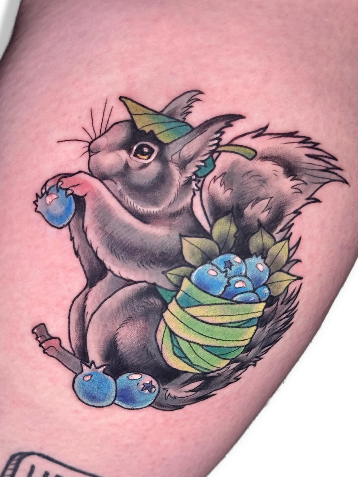 Rabbit with mushrooms American traditional tattoo on the thigh by Ash Sansoucie
