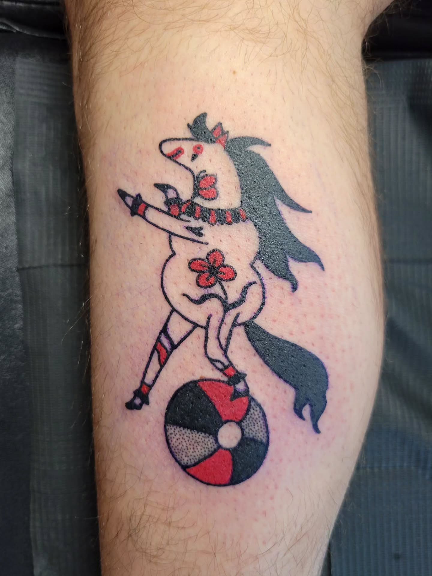 Horse with flower American traditional tattoo on the forearm by Cat Wong意藝