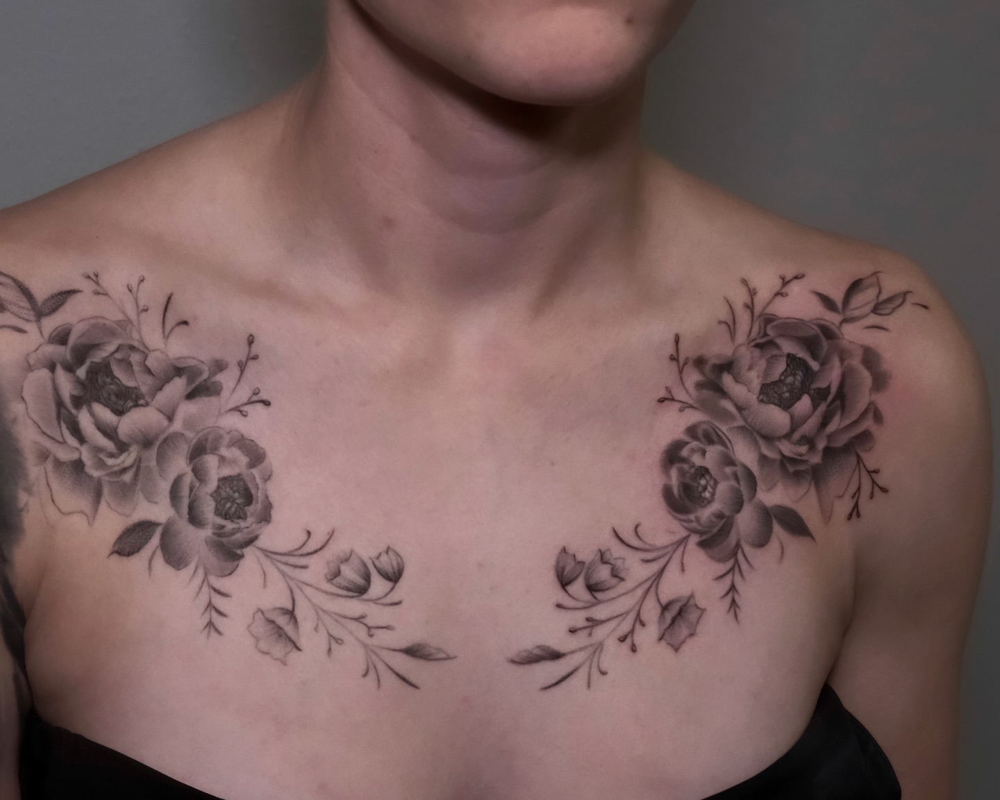 Floral arrangement black and grey tattoo on the chest by AL 777, Denton, Texas