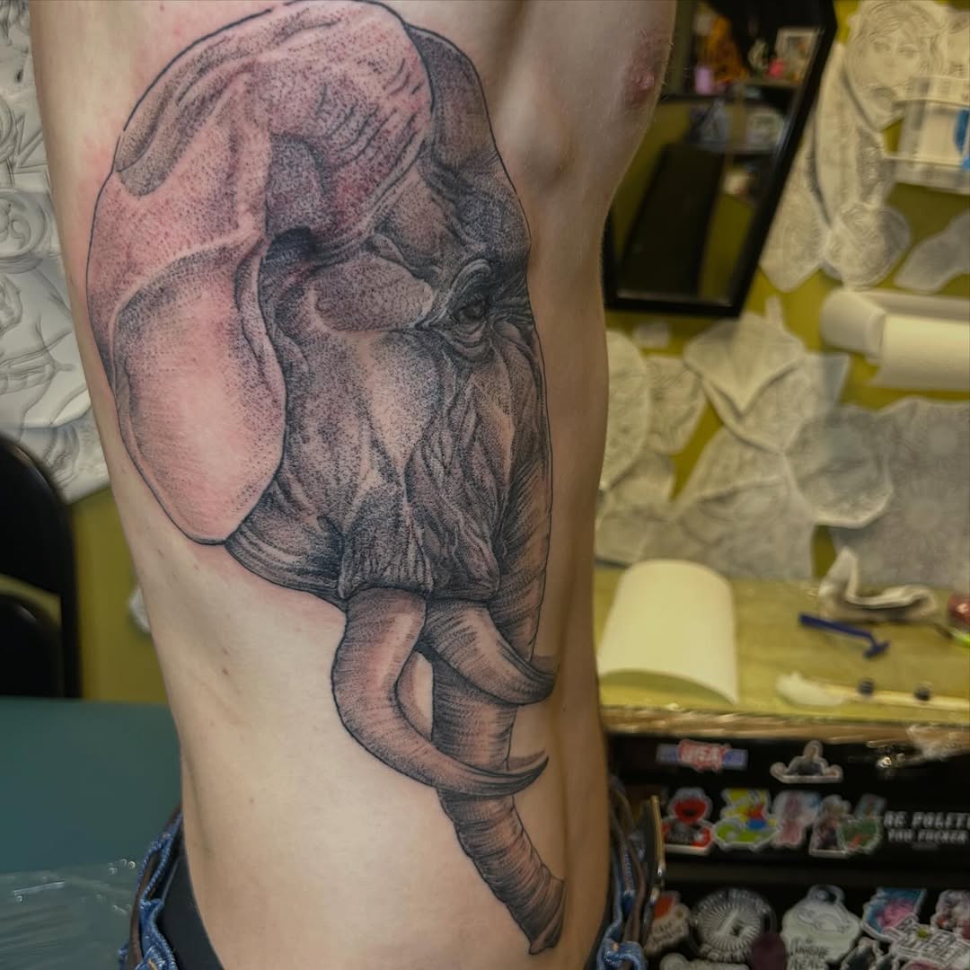 Tattoo by @izeatyerbrainz β realism, dotwork