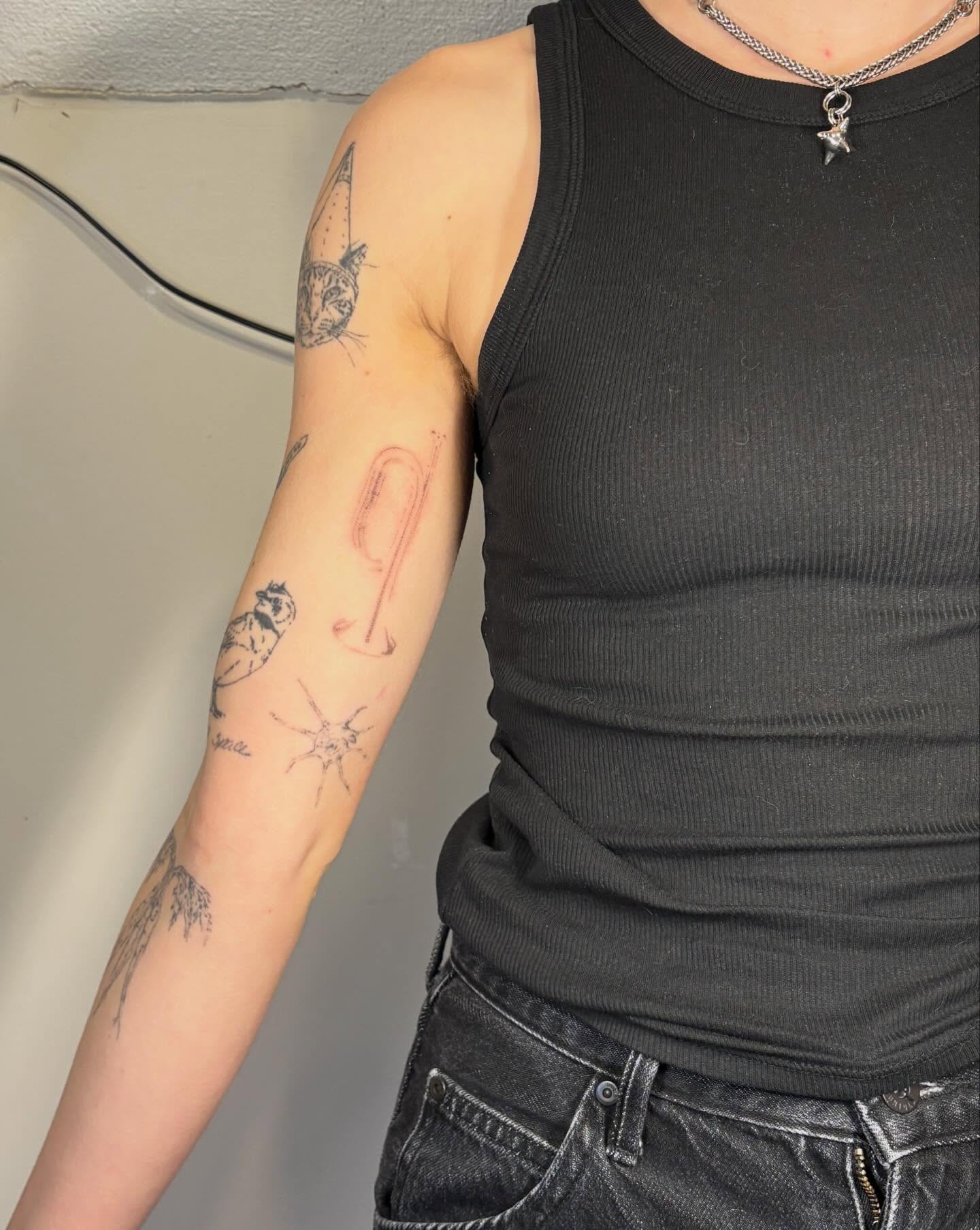 Tattooed lettering dotwork tattoo on the forearm by Jill