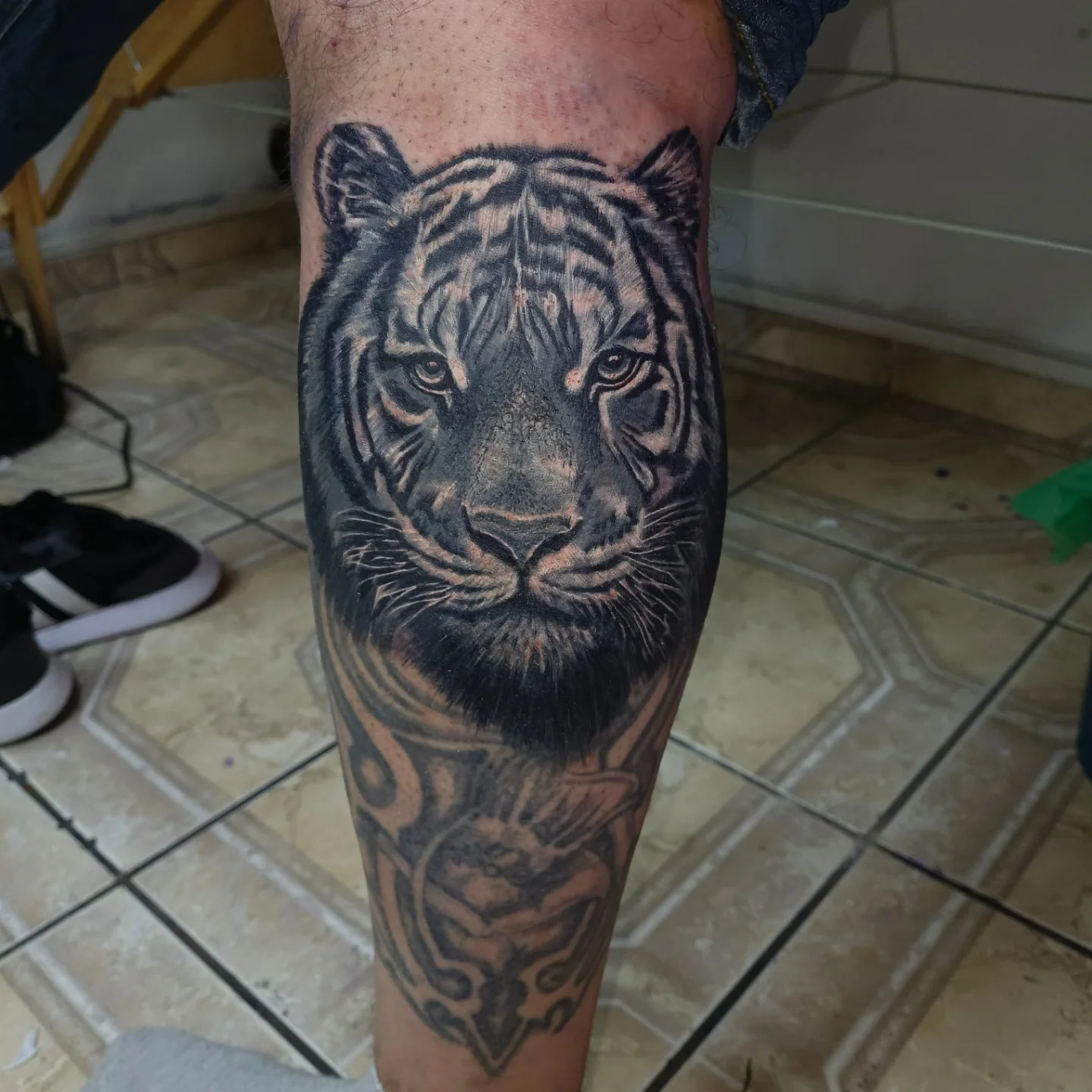 Tiger realism tattoo on the forearm by Alexander Tattooink
