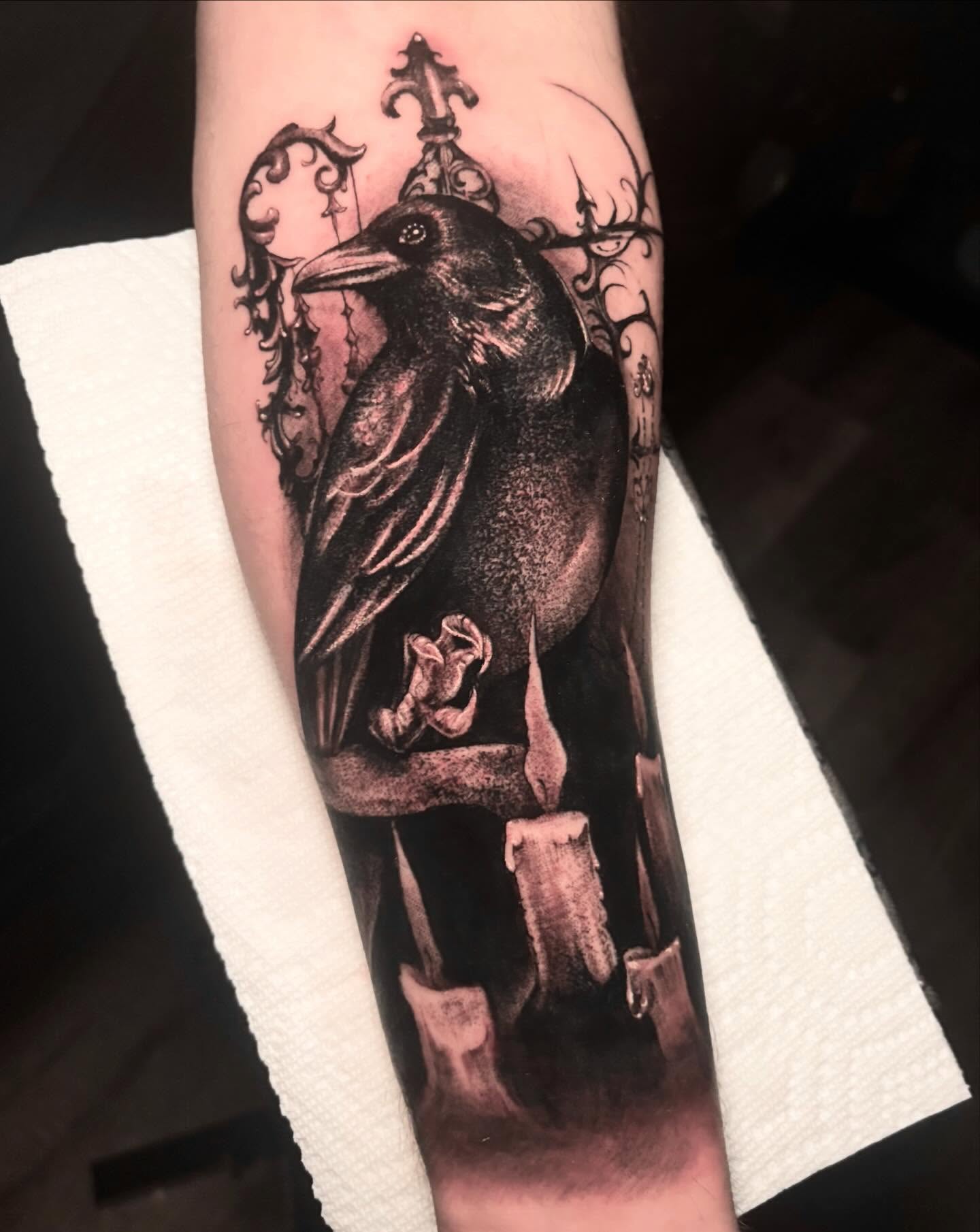 Crow realism tattoo on the forearm by Alle