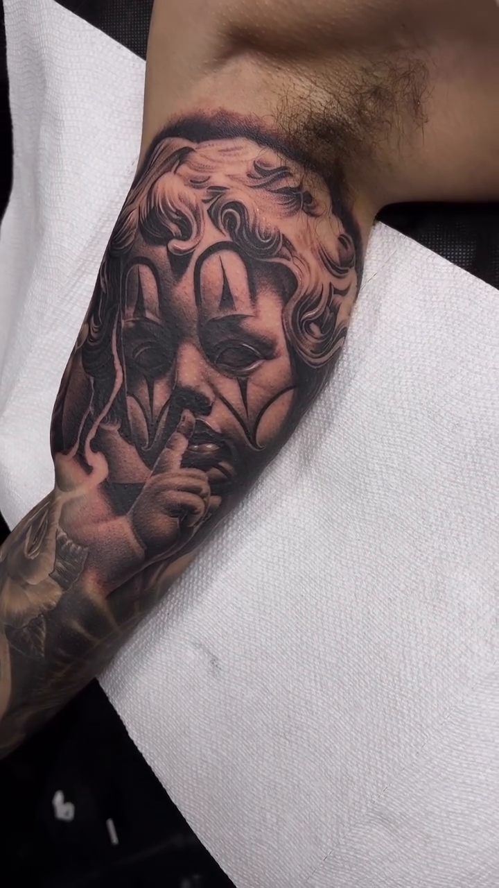Bust of a classical figure realism tattoo by Antonio Pavić, Los Angeles, California