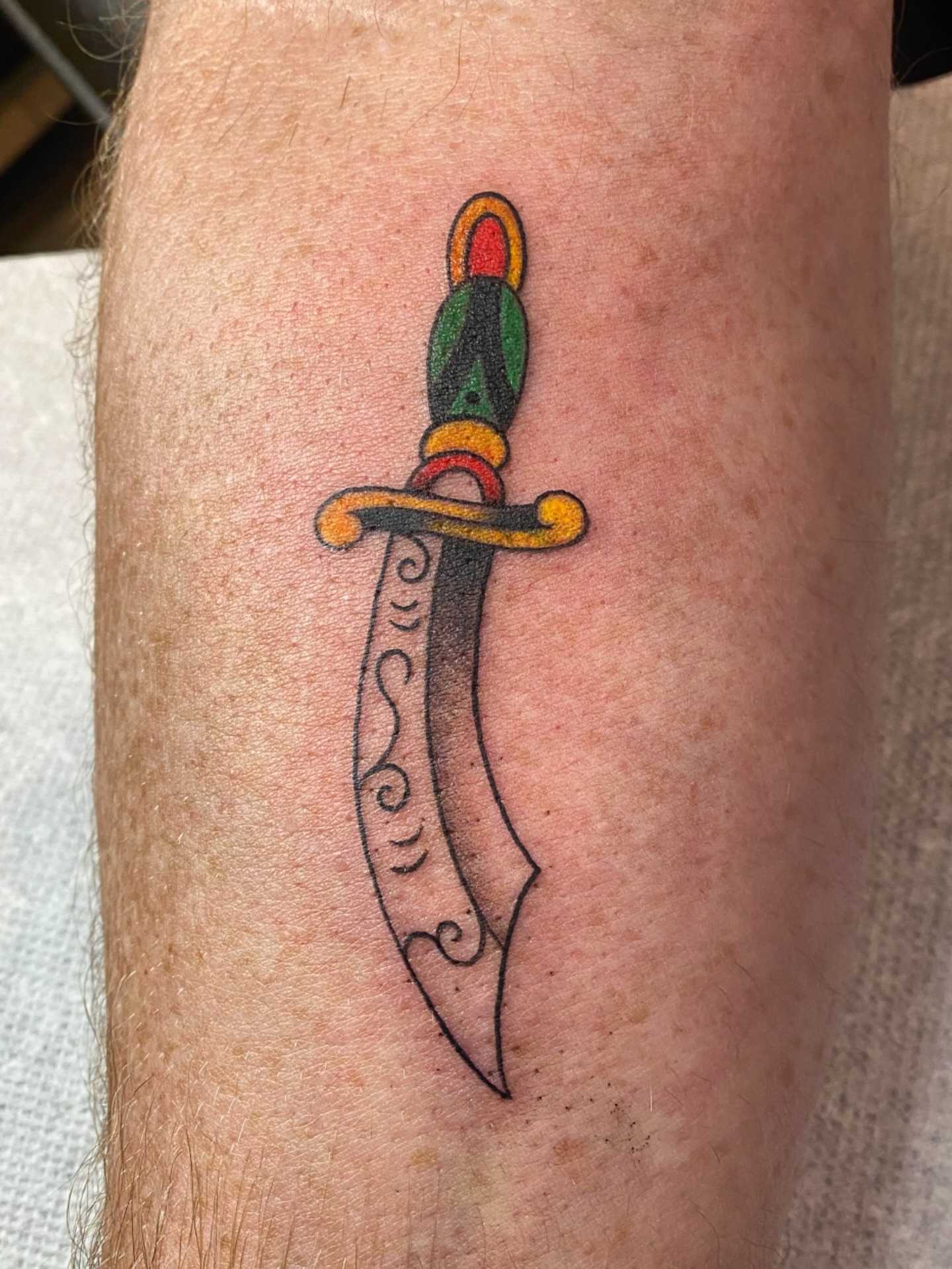 Saber American traditional tattoo on the forearm by Karl Hegwein, Portland, Oregon