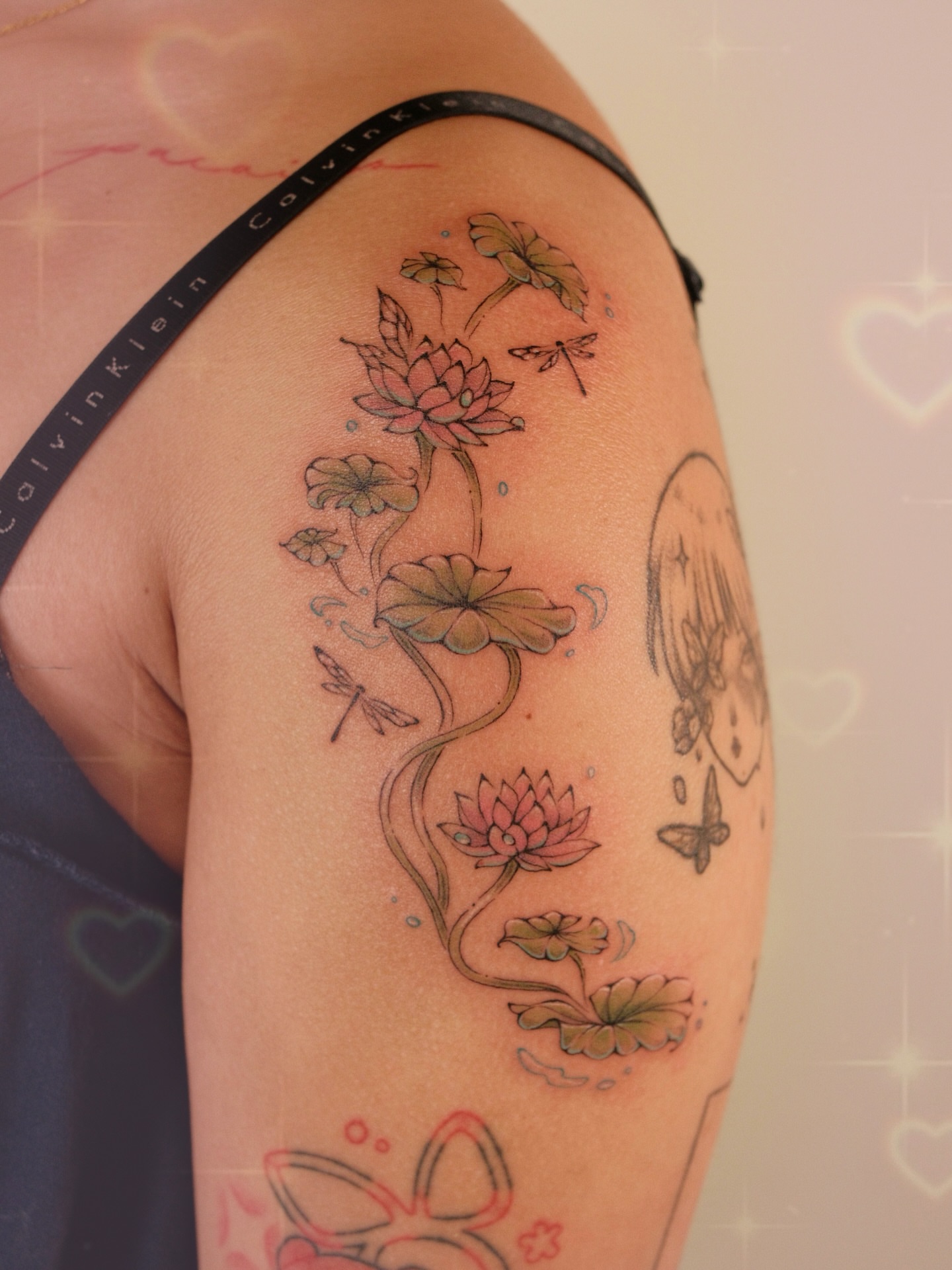 Lotus flowers and dragonflies new school tattoo on the shoulder by ââŪ. Ý ðķðð―ððð âðĶđËâ seattle tattoo artist, Seattle, Washington