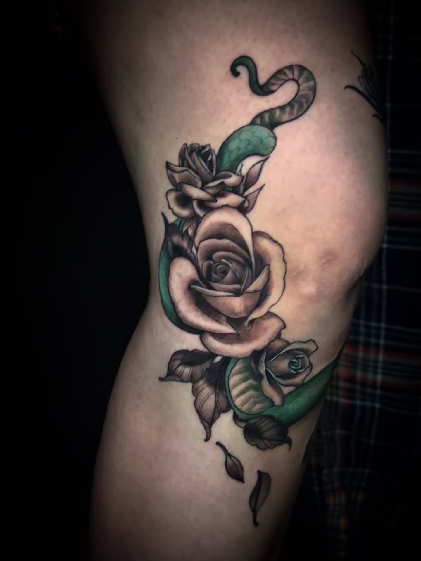 Snake and roses American traditional tattoo on the thigh by M A D I E I N S P A N I E R π¦ tattoos