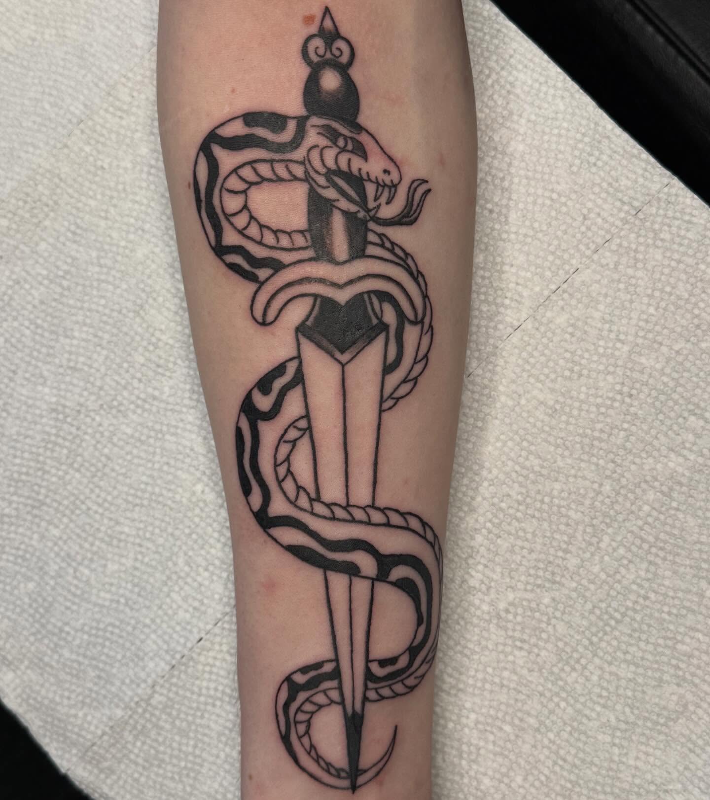 Sword and snake black and grey tattoo on the forearm by 🌛 𐌀𐌋𐌄𐋄𐌉𐌔 🌜