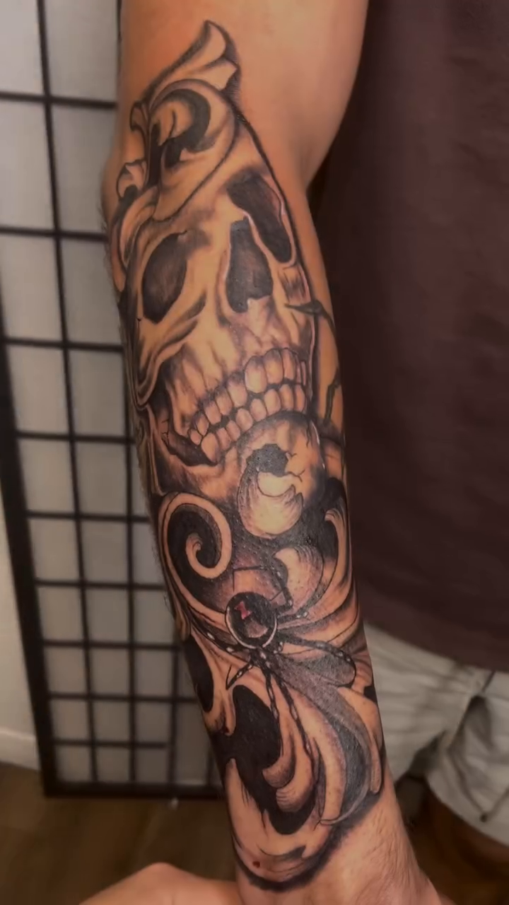 Skull with ornate swirls realism tattoo by Ink by Hailey π
