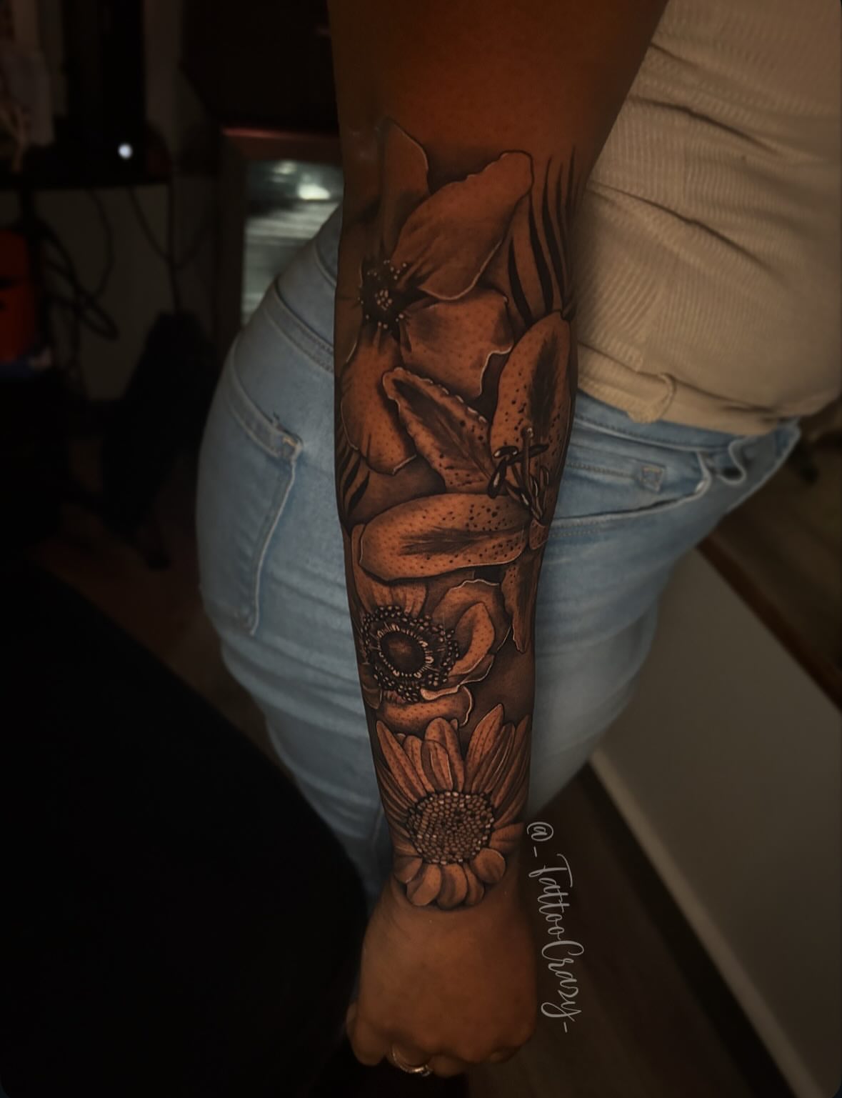 Flowers realism tattoo on the forearm by TattooCrazy🎭