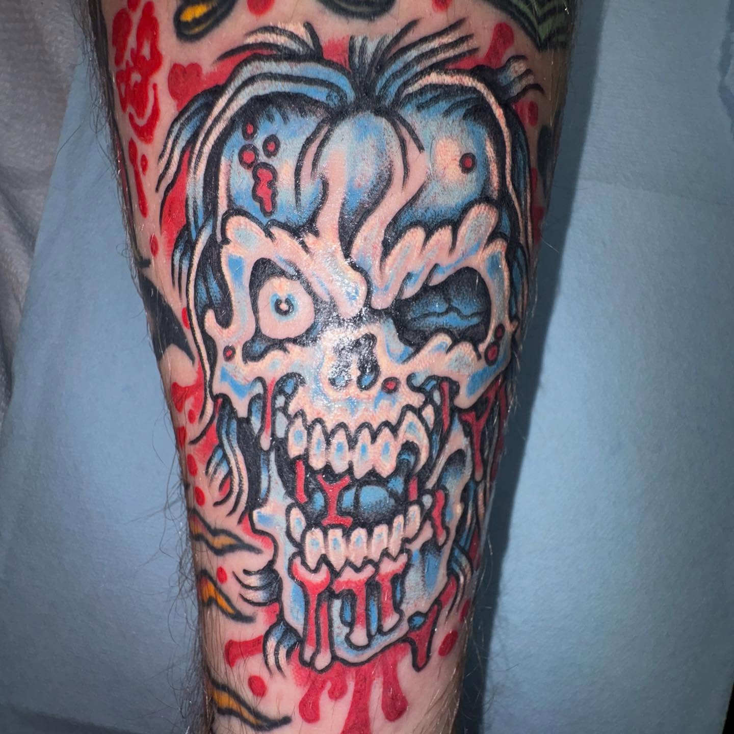 Skull American traditional tattoo on the forearm by Brendan Smith