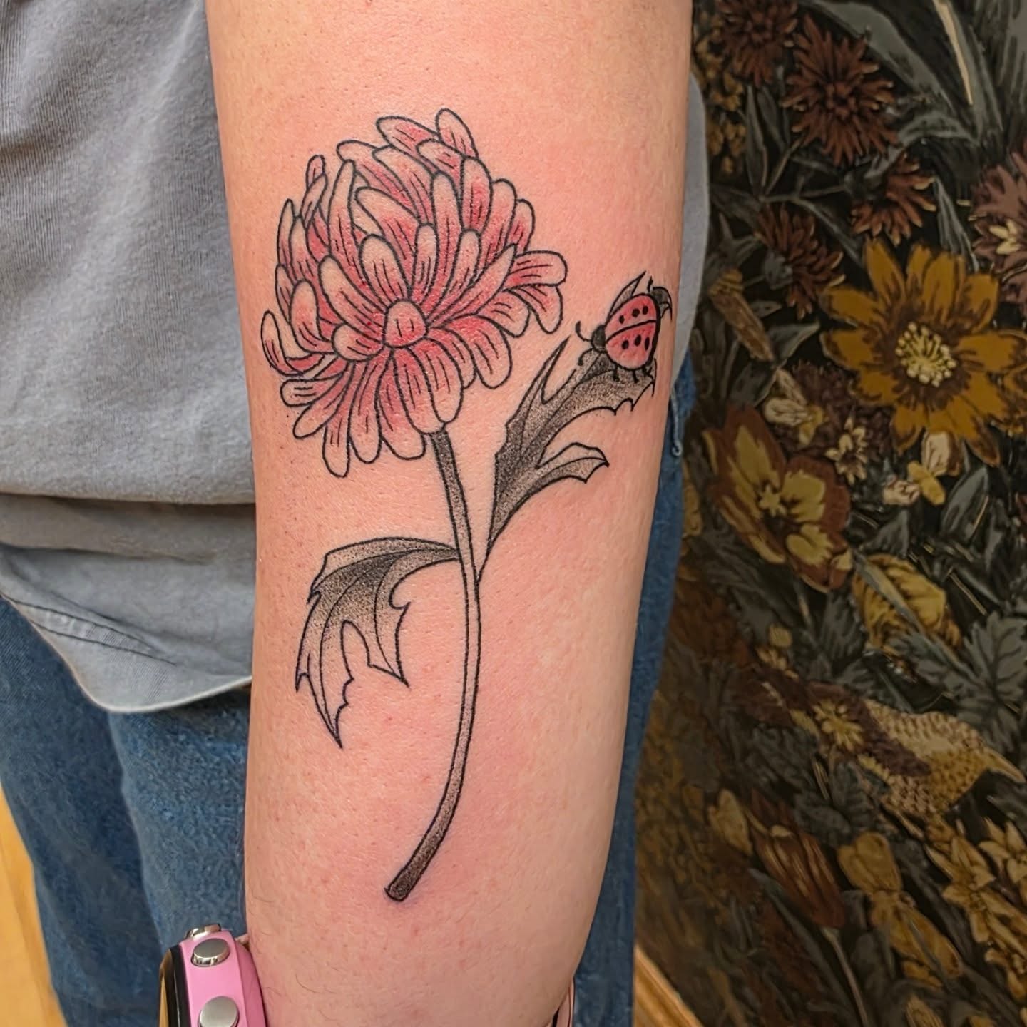 Chrysanthemum dotwork tattoo on the forearm by Tattoos by Annie