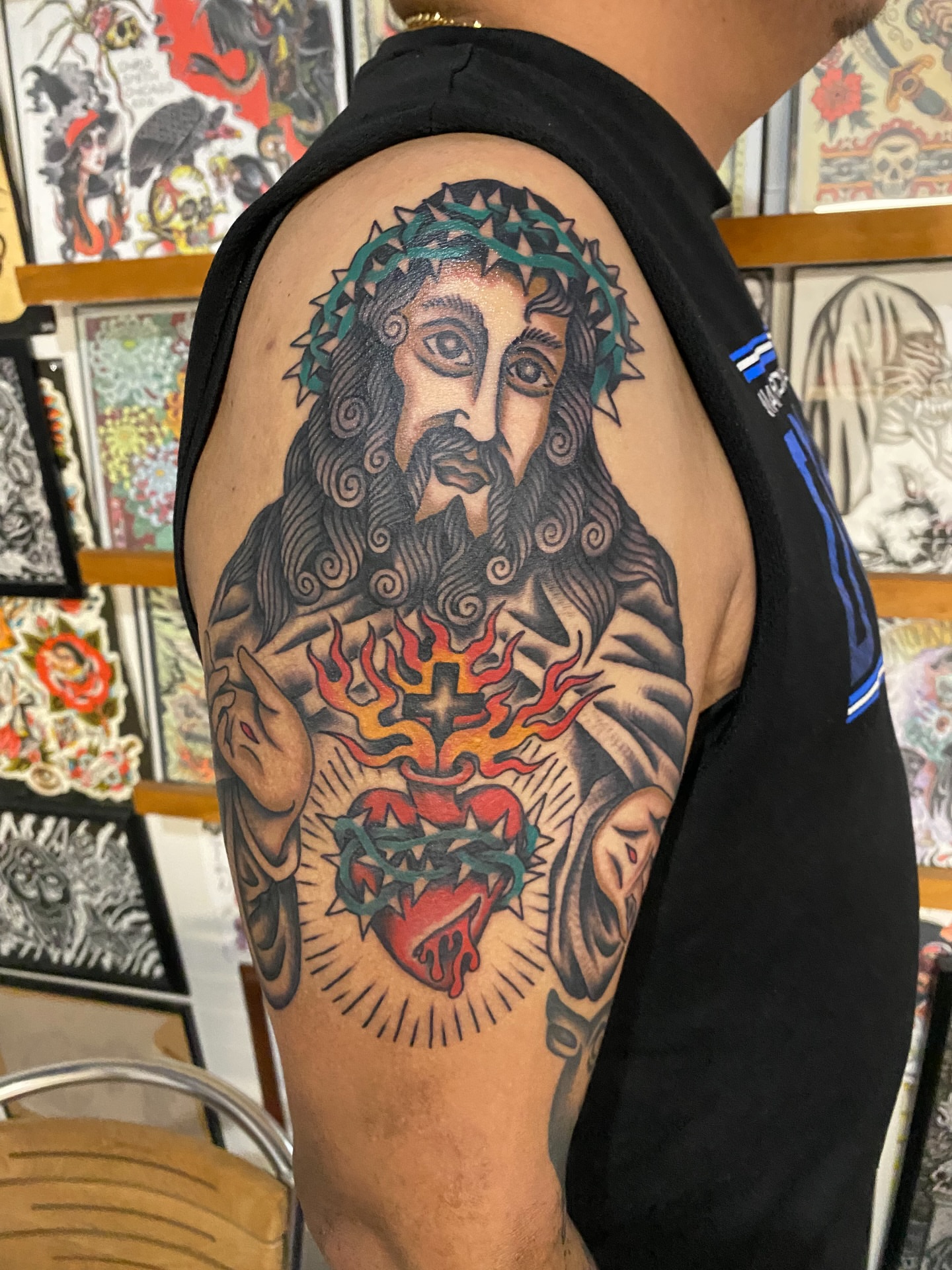 Jesus Christ American traditional tattoo on the shoulder by sean drennen