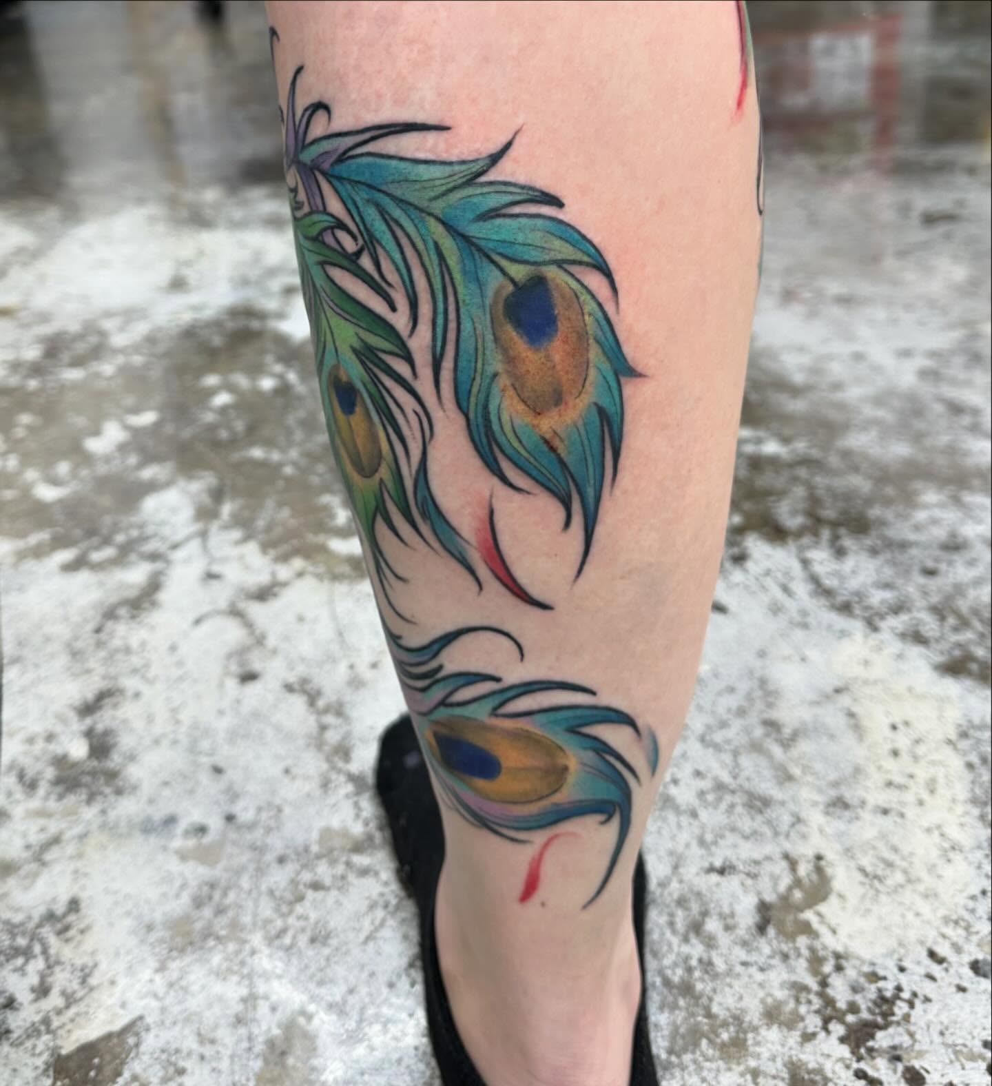 Peacock feathers new school tattoo on the calf by mychaela ๐ฑ