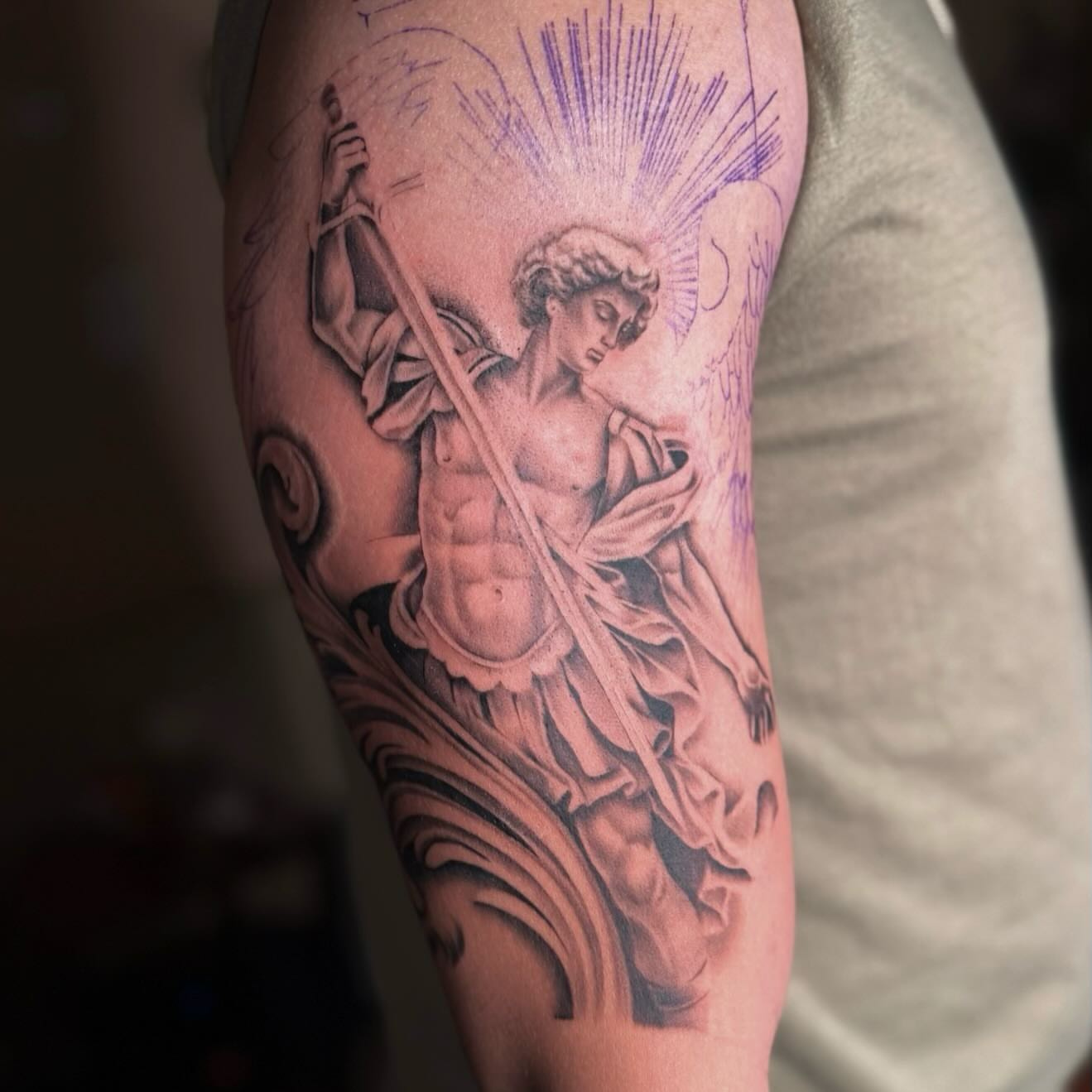 Angelic figure realism tattoo on the forearm by Jas Knight