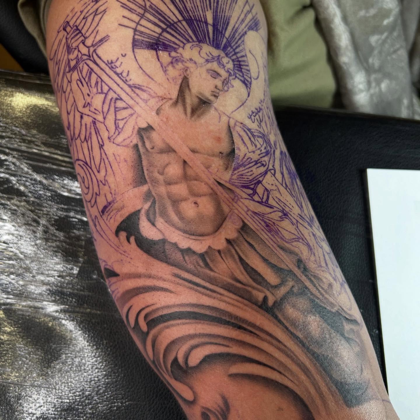 Mythical warrior realism tattoo on the forearm by Jas Knight