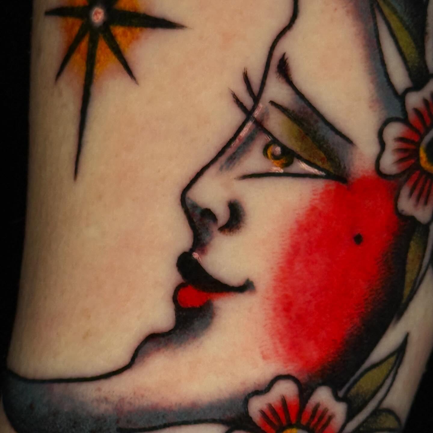 Woman's profile American traditional tattoo on the forearm by Mallory Brown
