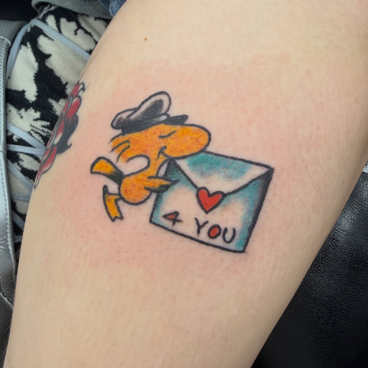 Love letter American traditional tattoo on the thigh by c☮︎urt