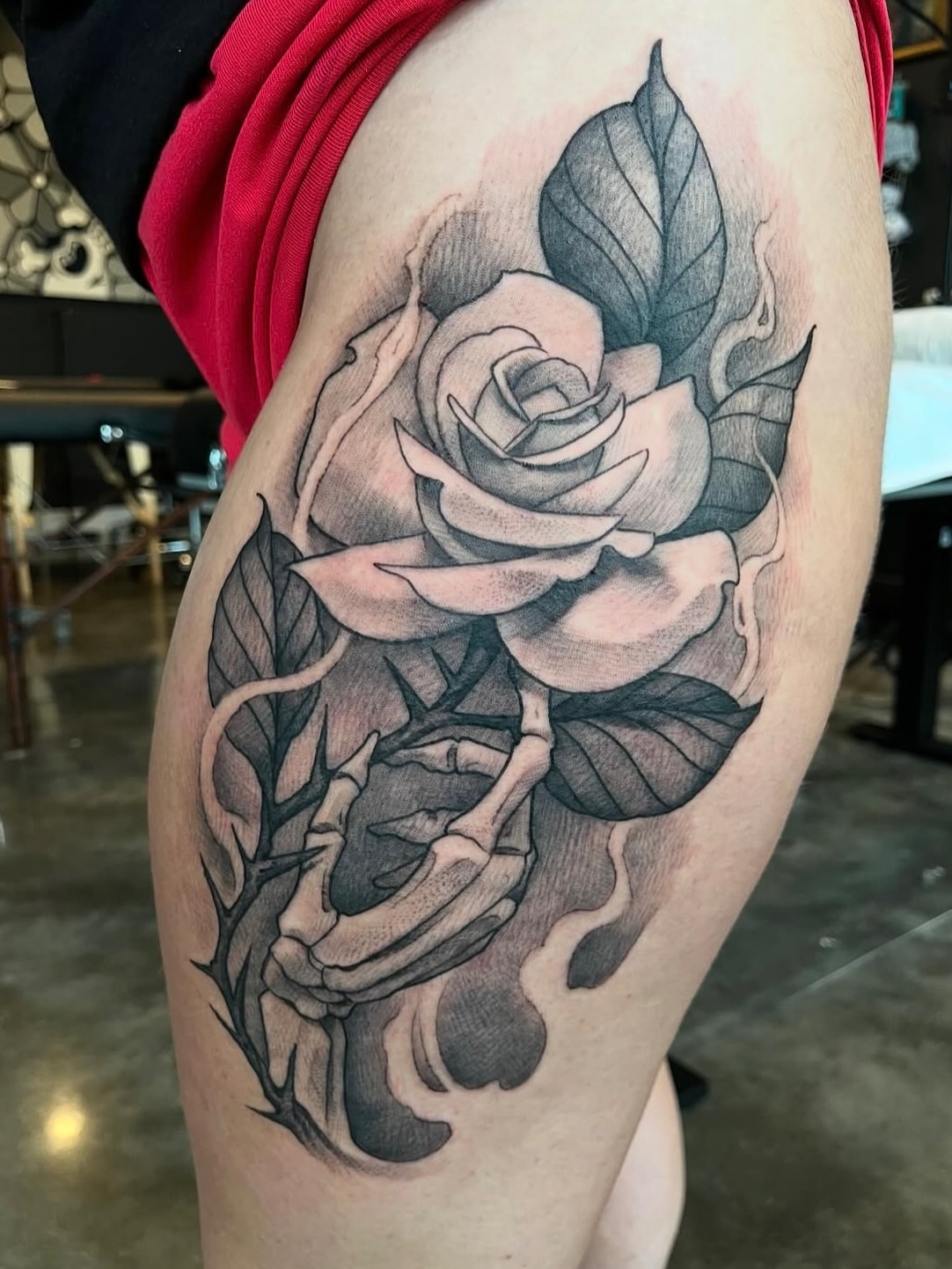 Rose realism tattoo on the thigh by Ian White