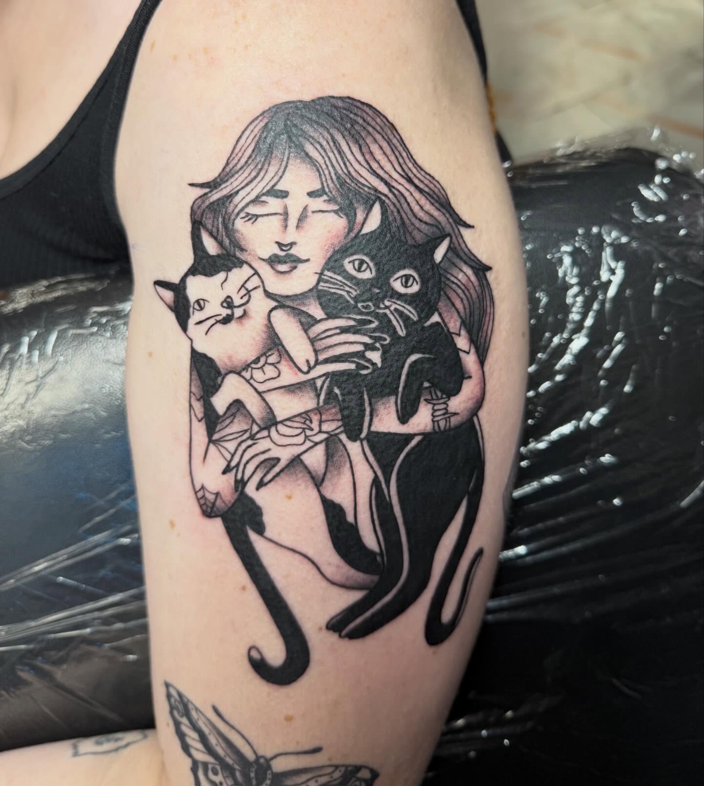 Woman with cats realism tattoo on the thigh by Abby