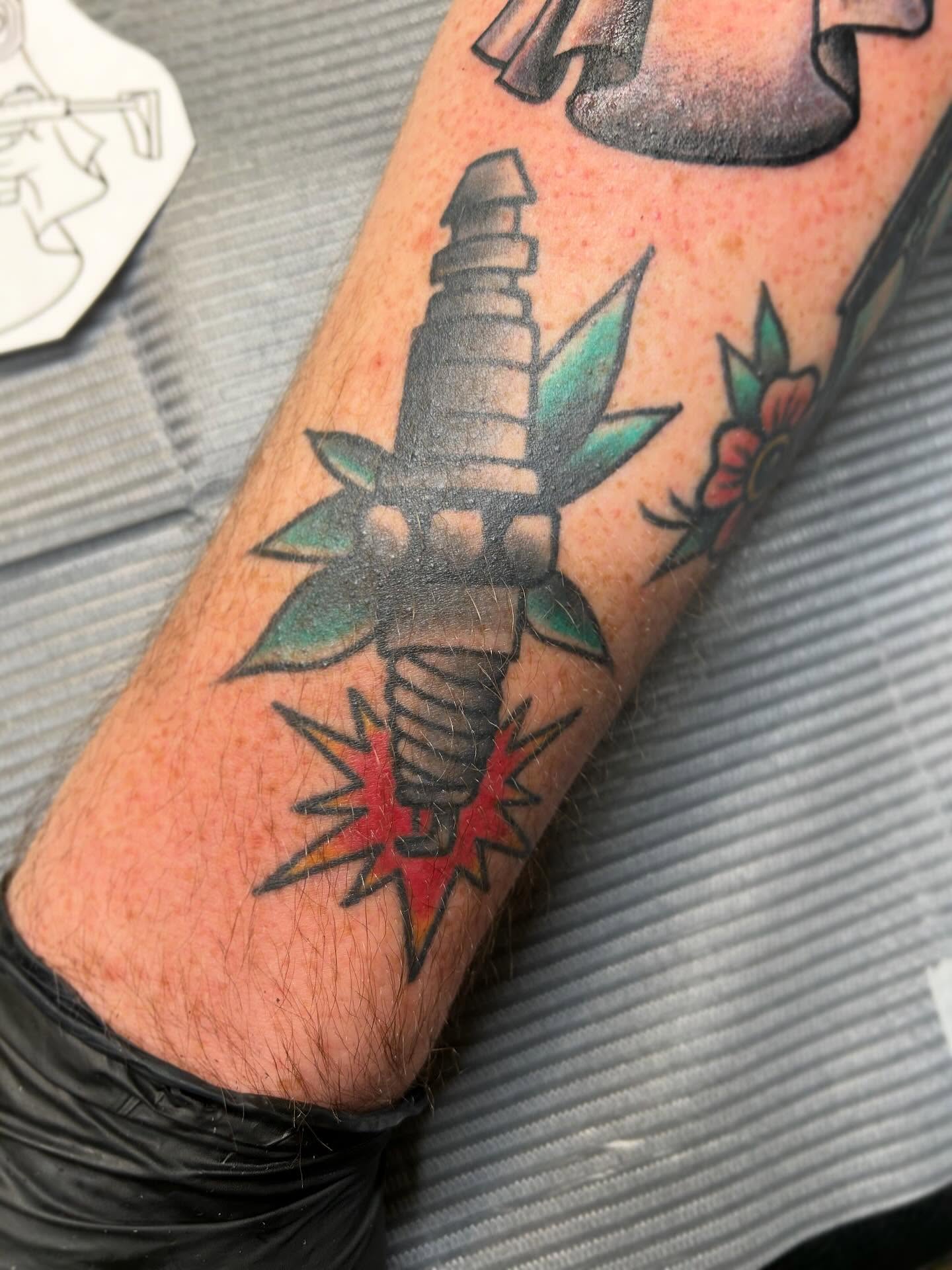Spark plug American traditional tattoo on the forearm by Morgan Hazer Tattoos, Cedar Rapids, Iowa