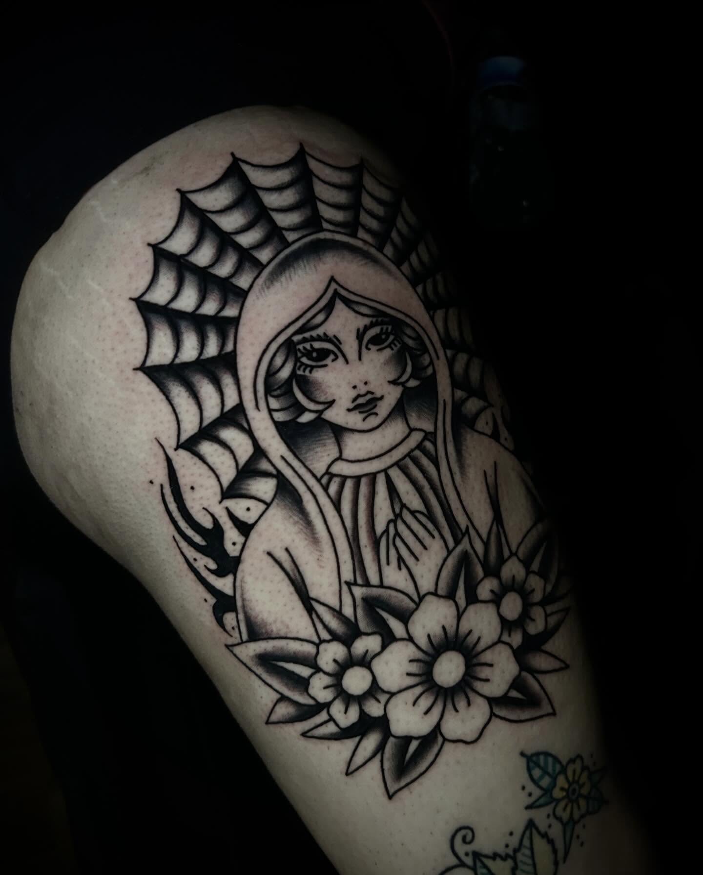 Religious figure American traditional tattoo on the shoulder by Heaven Arianna