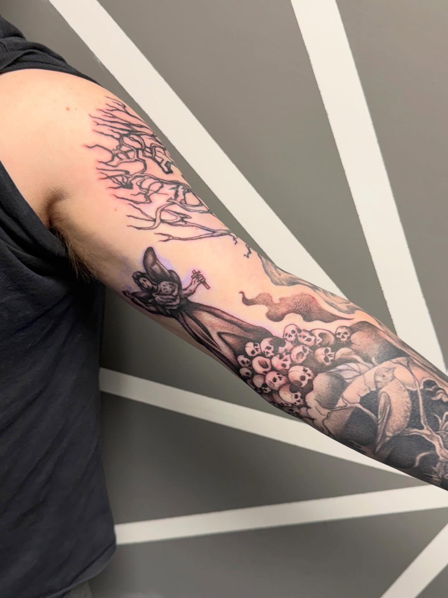Forest scene realism tattoo on the forearm by Katie Rojas