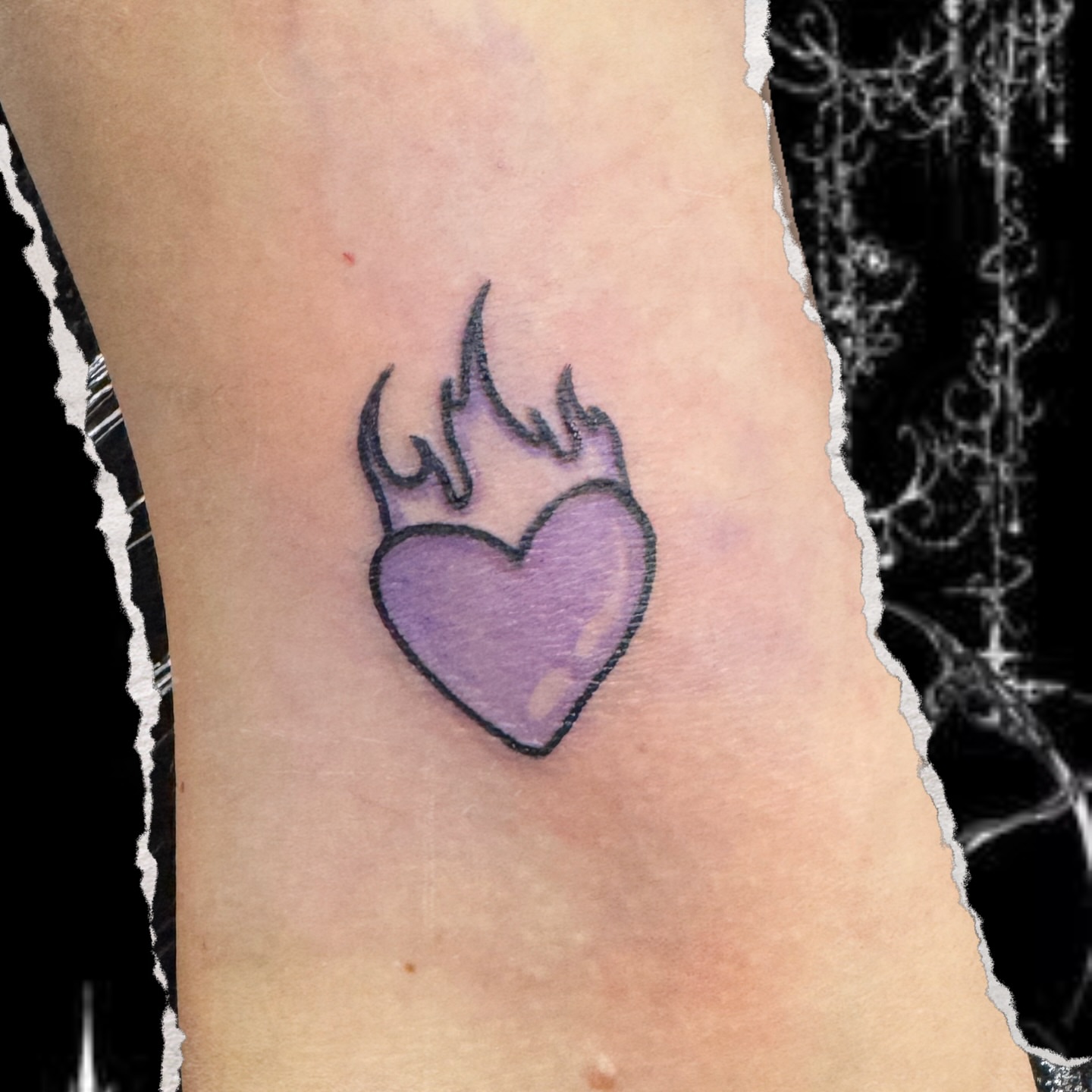 Flaming heart neo-traditional tattoo on the forearm by Seth Christianson