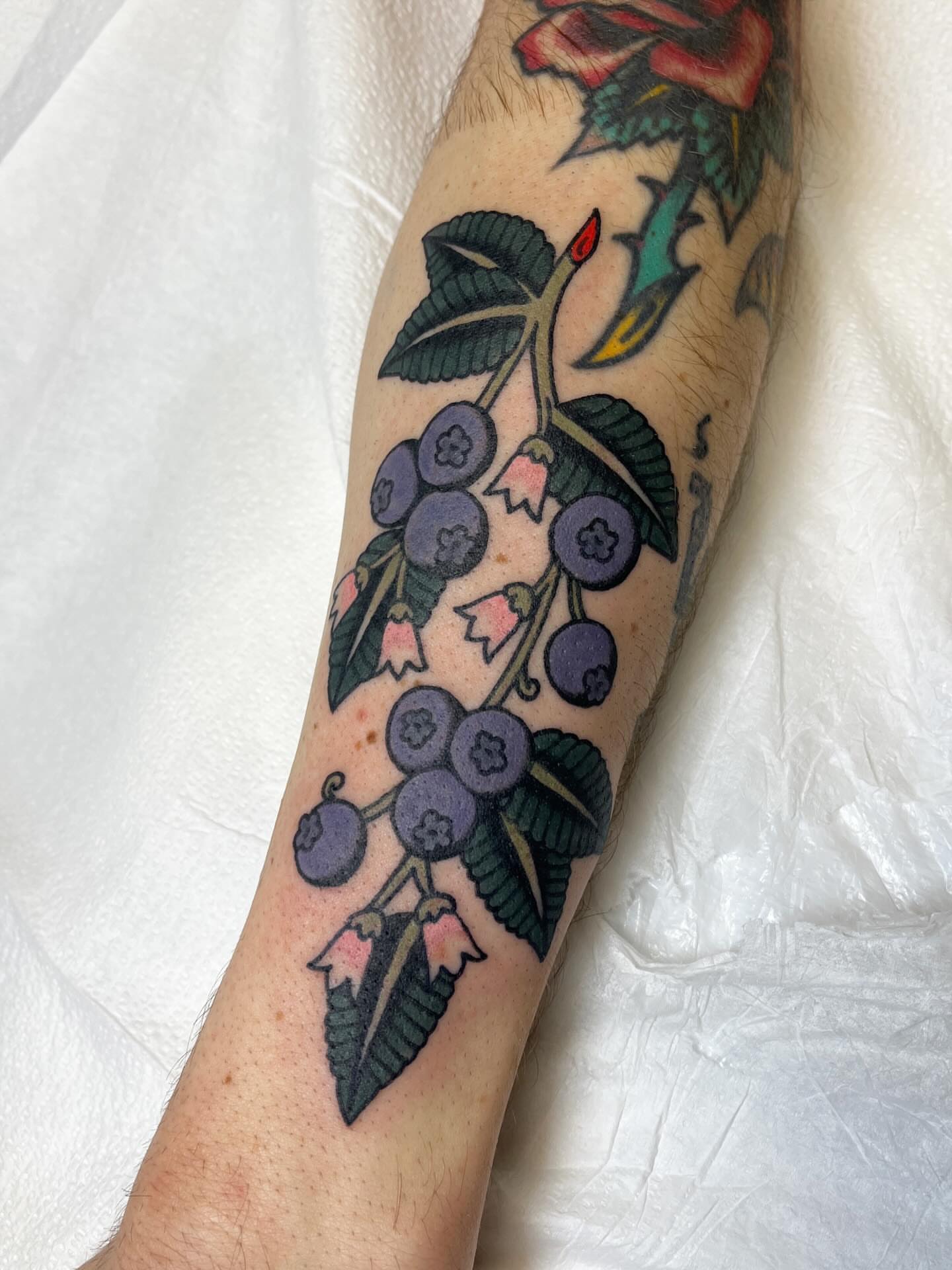 Blueberries American traditional tattoo on the forearm by 🌞all Bodies Welcome🌞