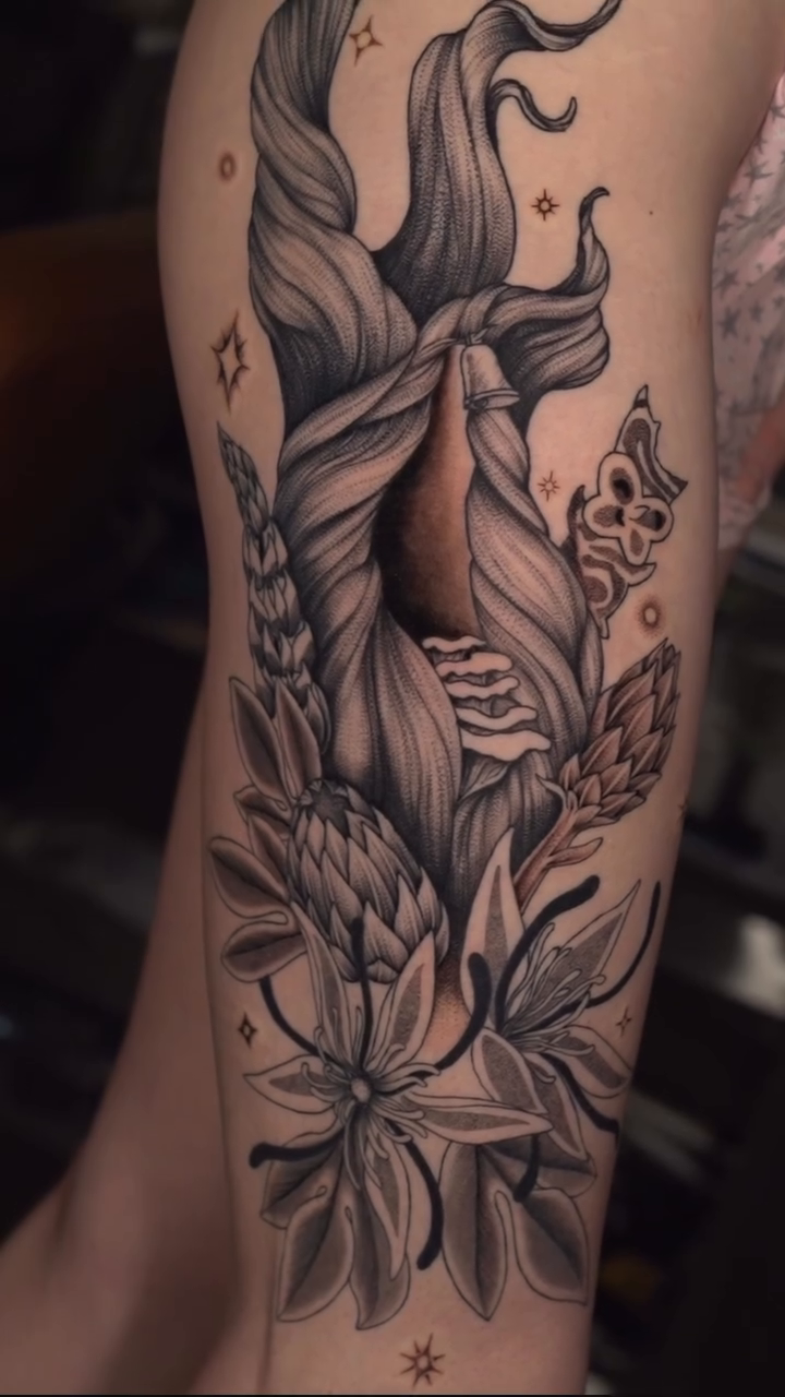 Dotwork tattoo on the thigh by Kenzie Mecham-Cunningham