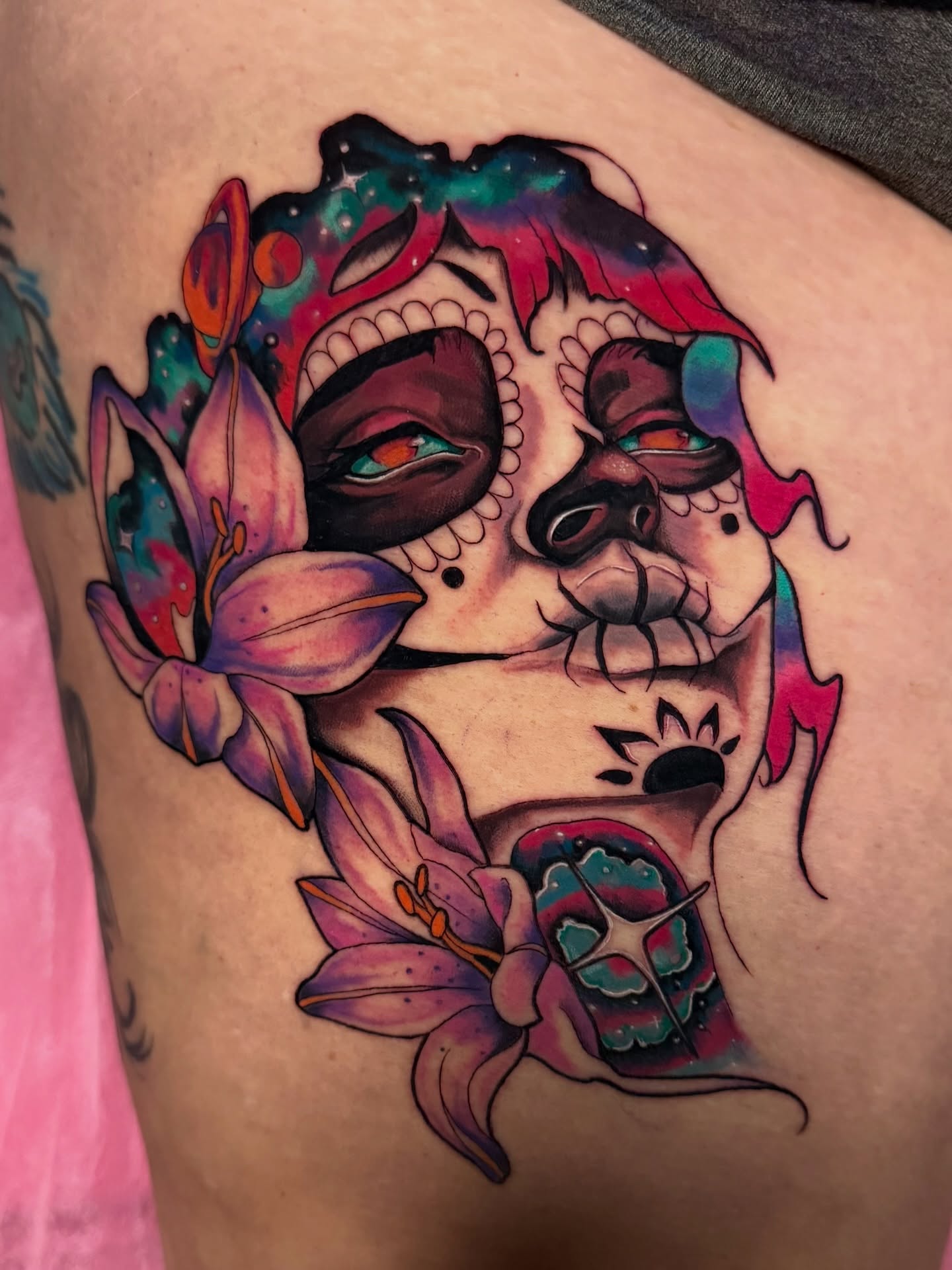 Sugar skull with flowers American traditional tattoo on the thigh by ✨Jen Lochbihler✨, Dickson, Tennessee