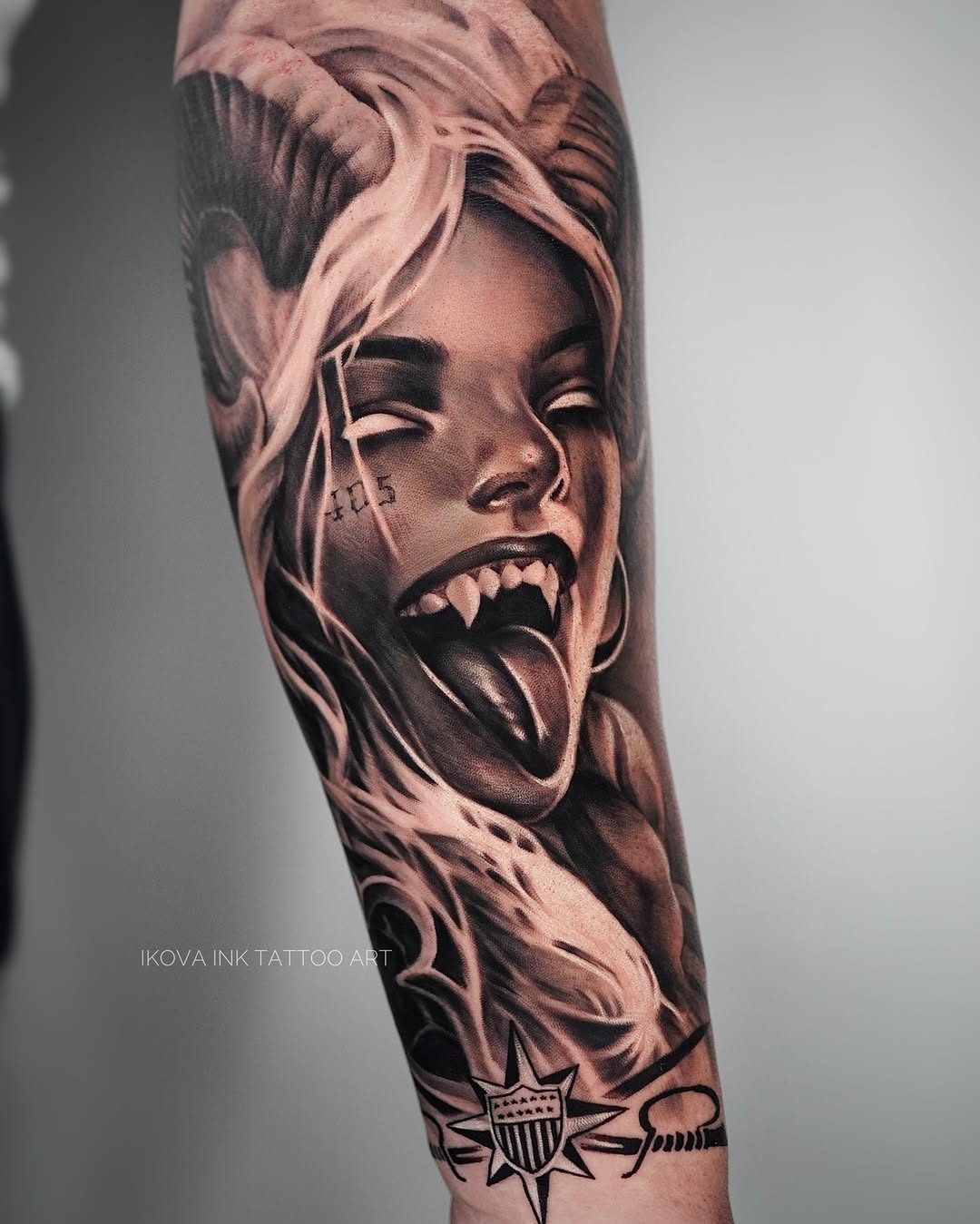 Demonic woman with fangs realism tattoo on the forearm by Tattoo Artist Miami & la, Hollywood, Florida