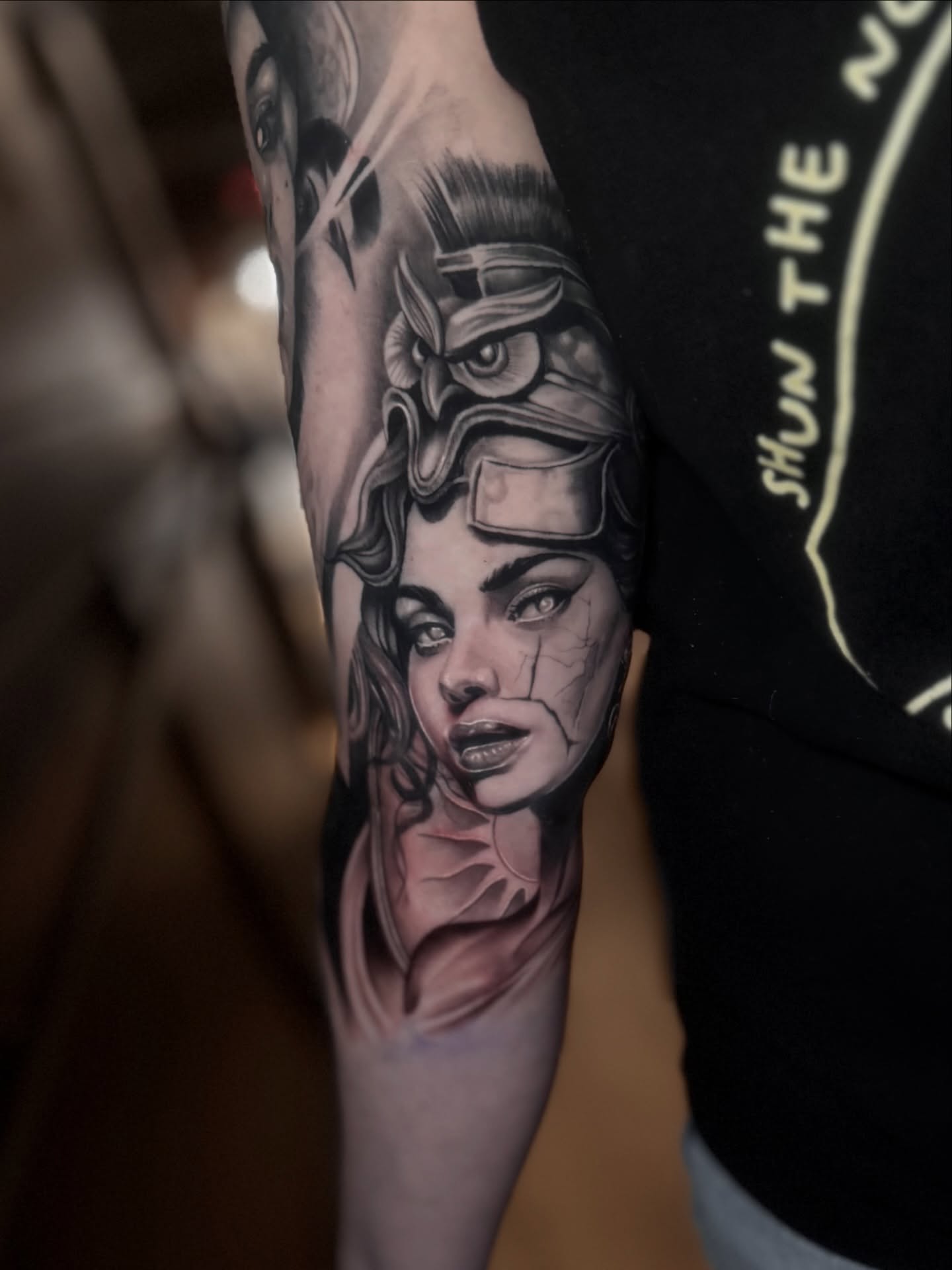 Woman's face realism tattoo on the forearm by Sebastian Calderon