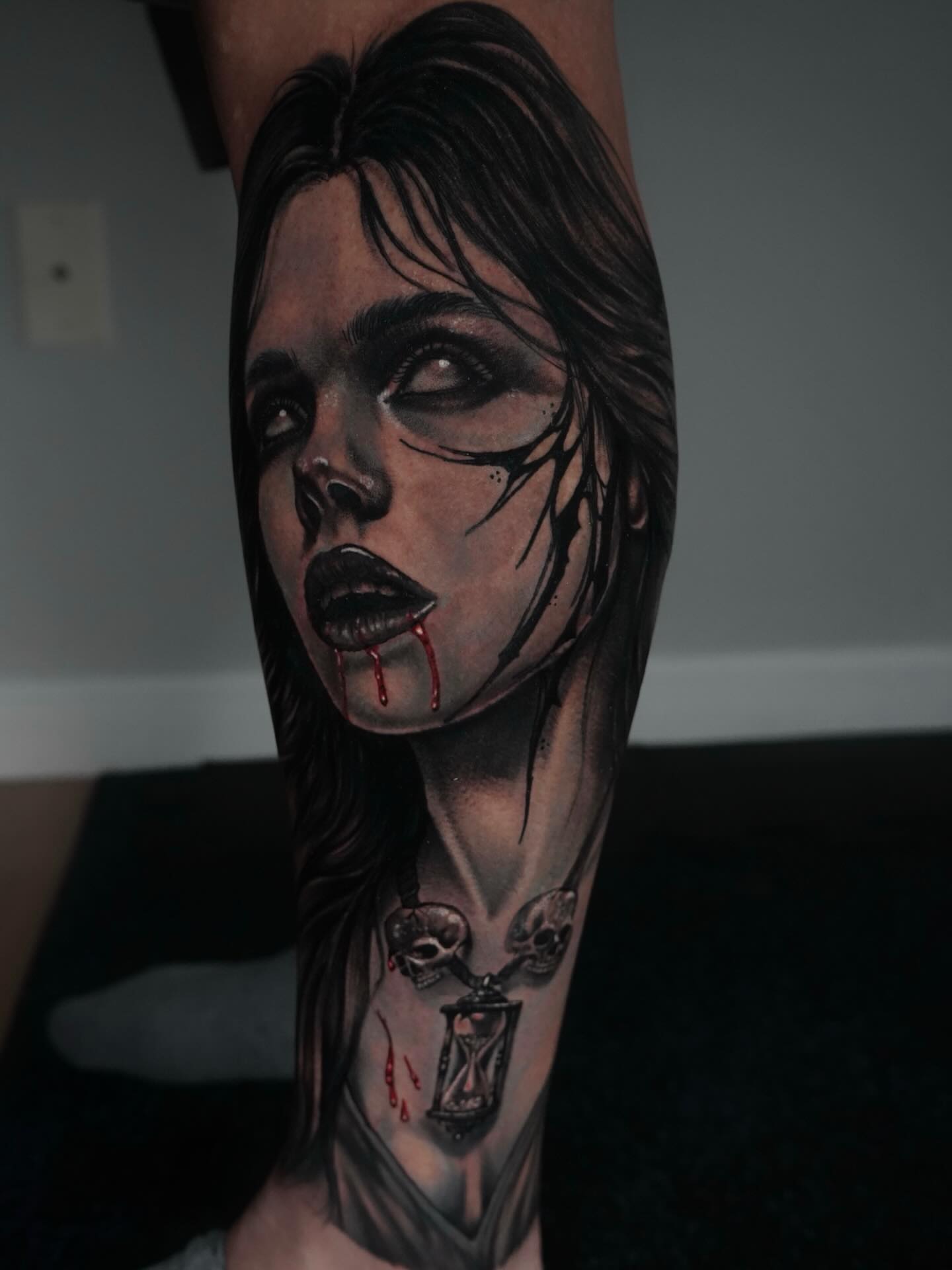 Woman with hourglass realism tattoo on the forearm by Carlos Trujillo
