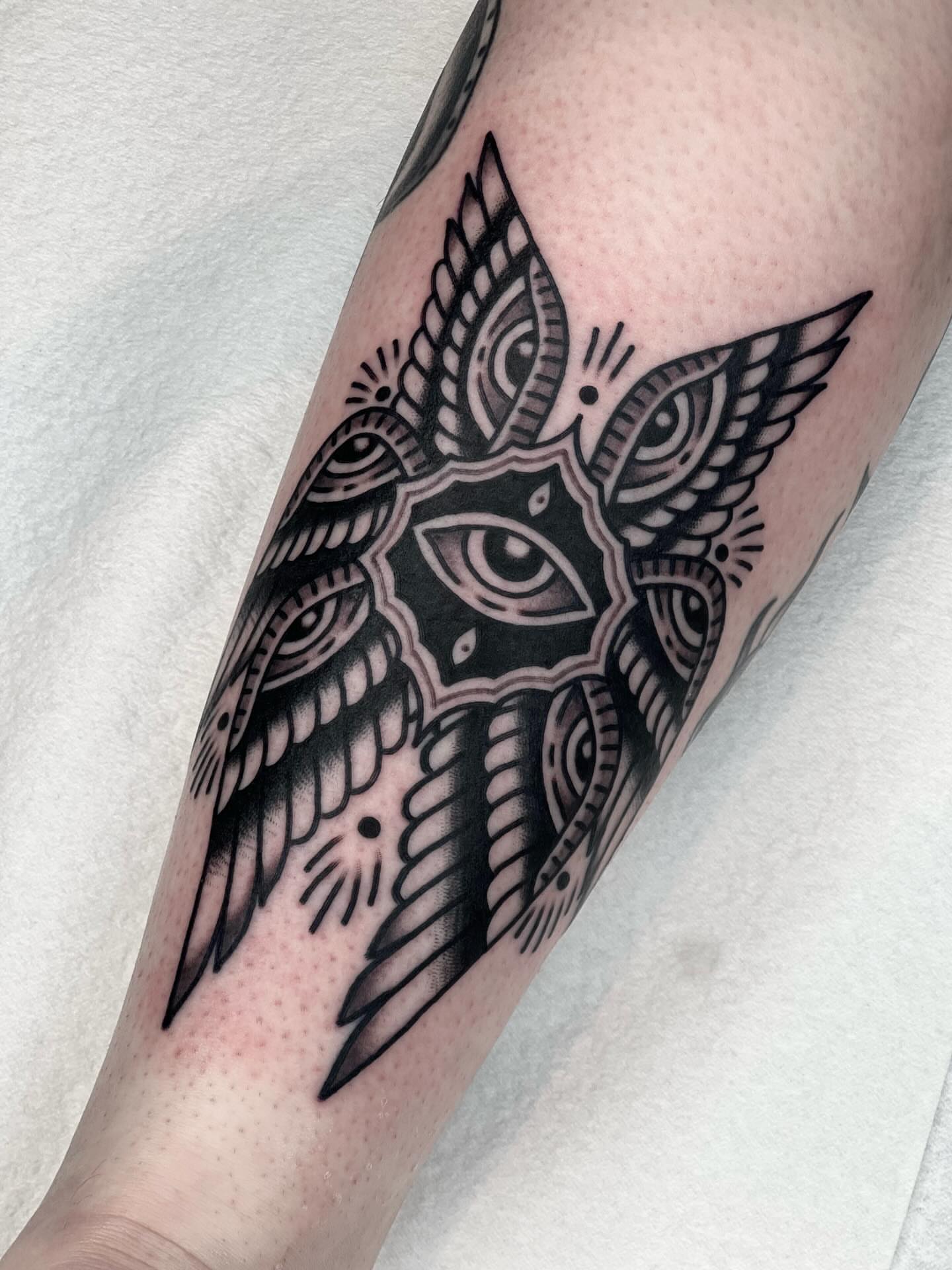 Owl black and grey tattoo on the forearm by Blake Francis, Worcester, Massachusetts