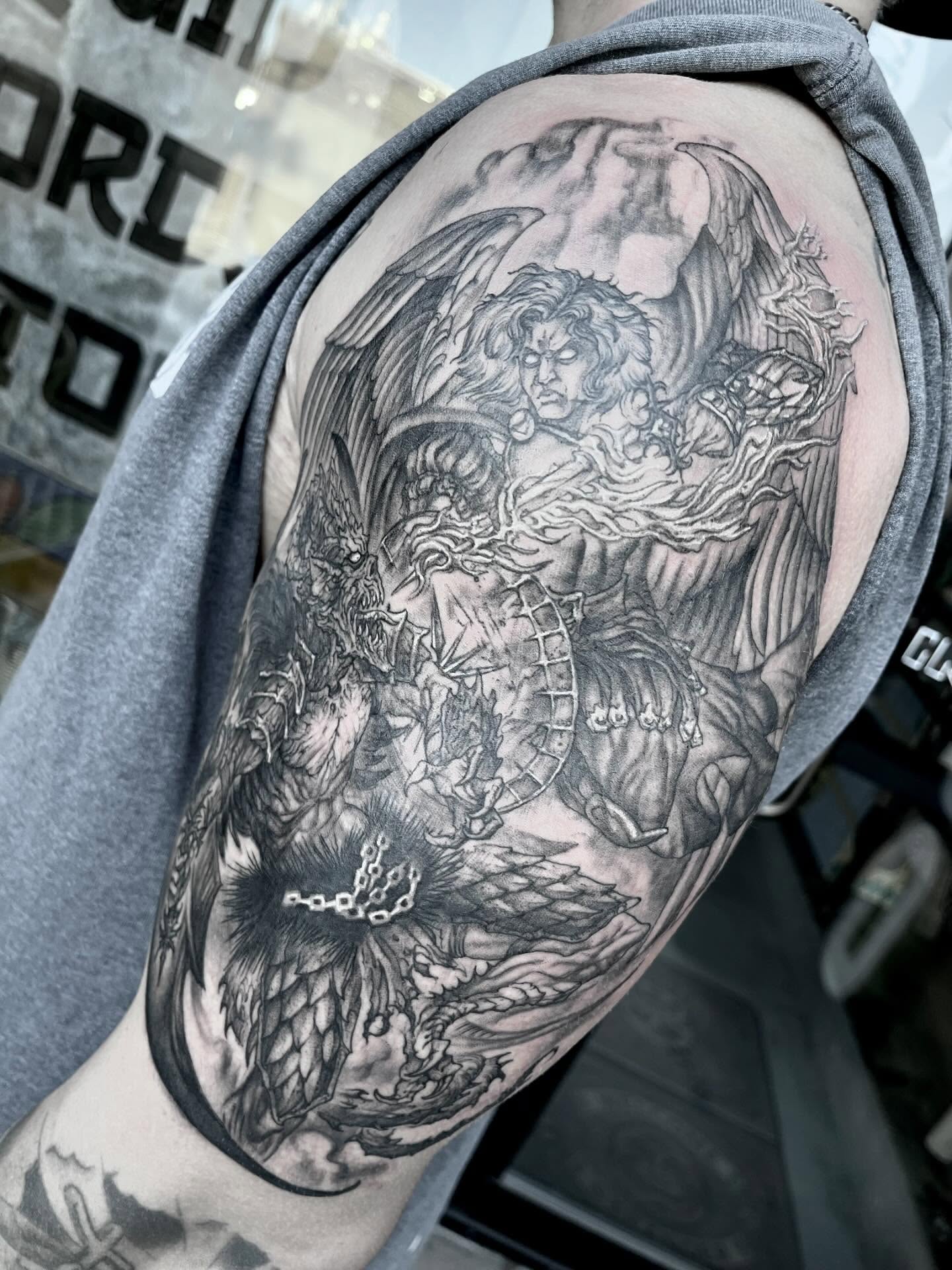 Angel with wings realism tattoo on the shoulder by Nathan Esteras