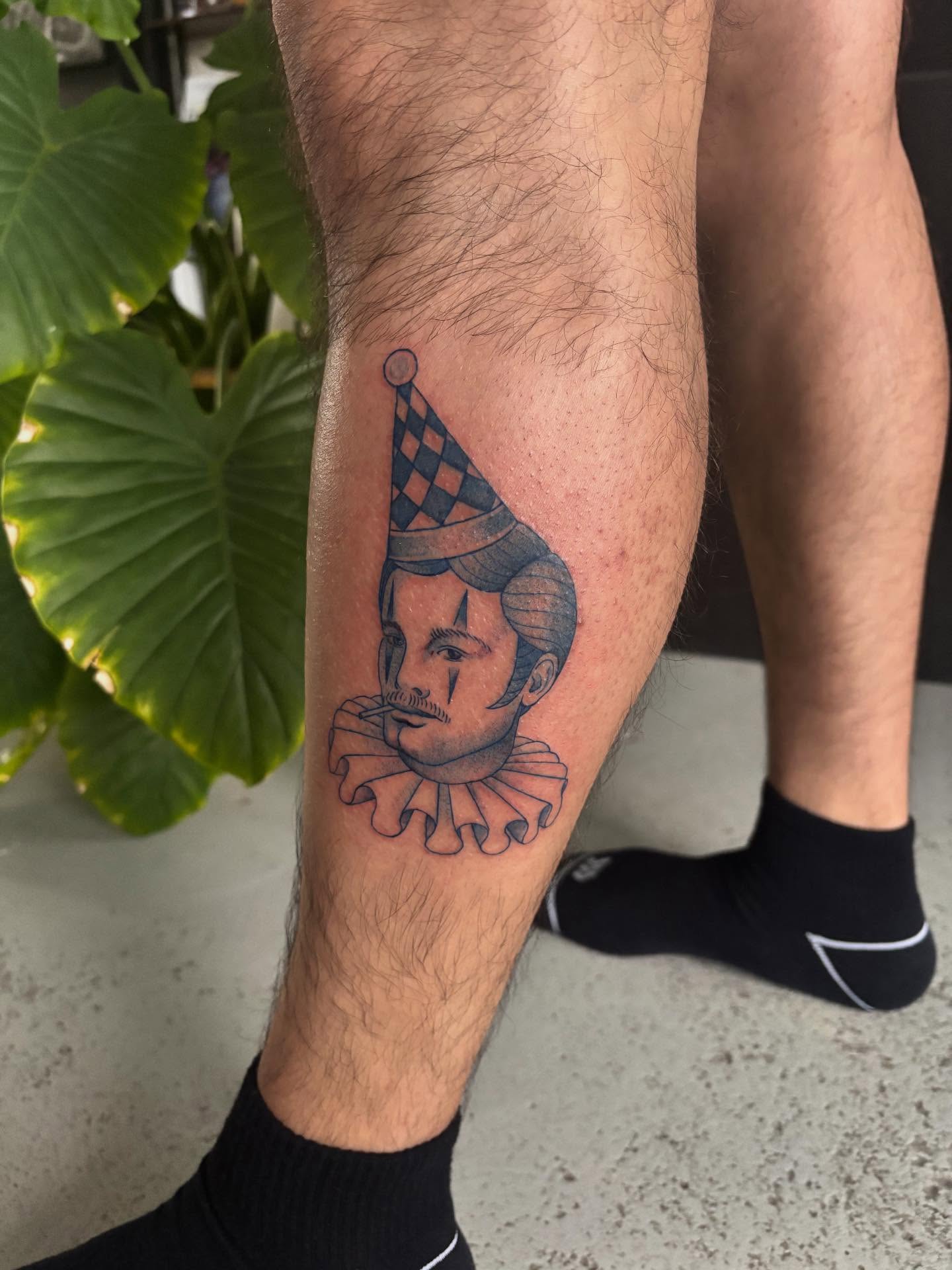 Clown portrait realism tattoo on the calf by Marissa Whitaker