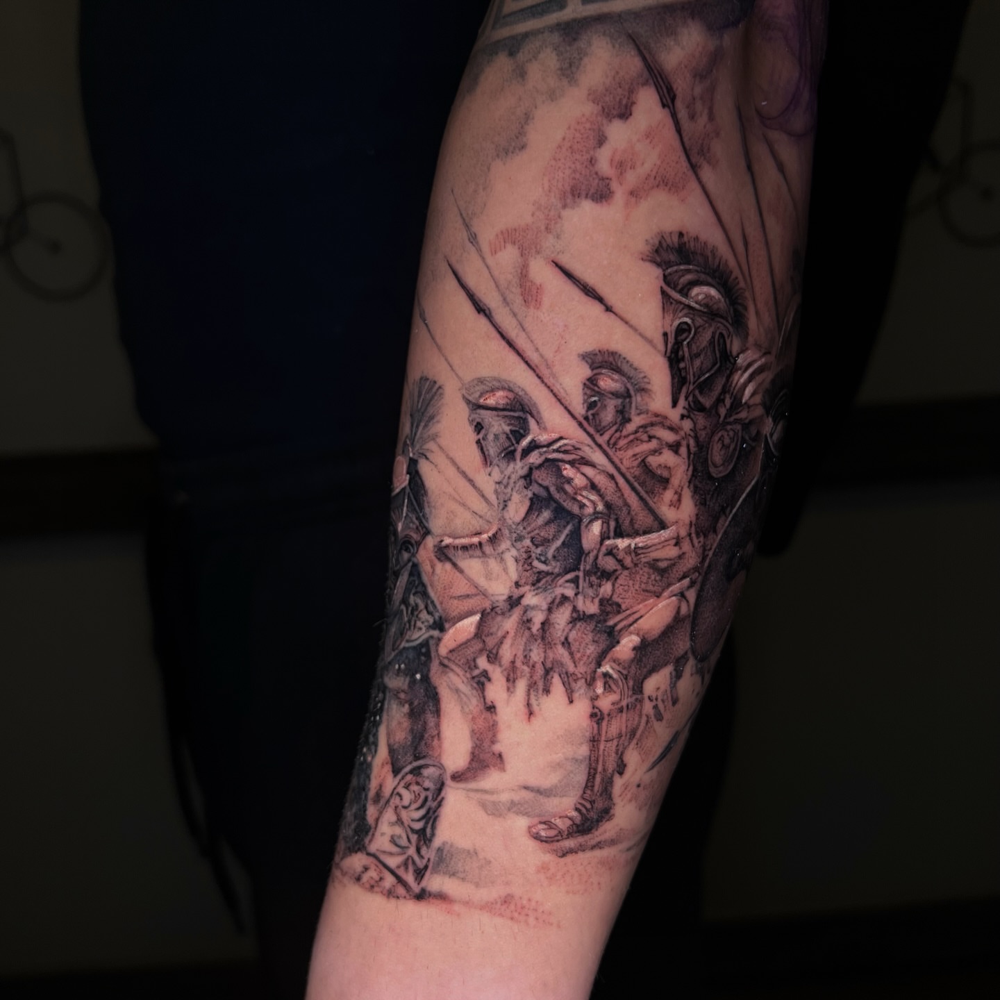 Warrior and dragon dark realism tattoo on the forearm by Dominick Cali, East Islip, New York